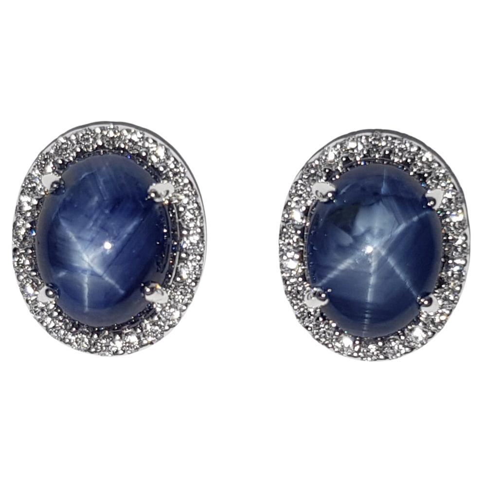 Blue Star Sapphire with Diamond Earrings set in 18K White Gold Settings For Sale