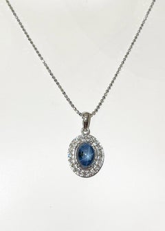 Blue Star Sapphire with Diamond Pendant set in 18K White Gold Settings