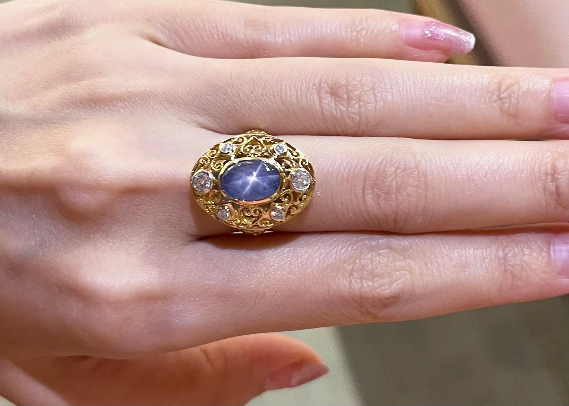 Blue Star Sapphire 2.70 carats with Diamond 0.34 carat Ring set in 14K Gold Settings

Width:  1.7 cm 
Length: 2.1 cm
Ring Size: 52
Total Weight: 5.32 grams

