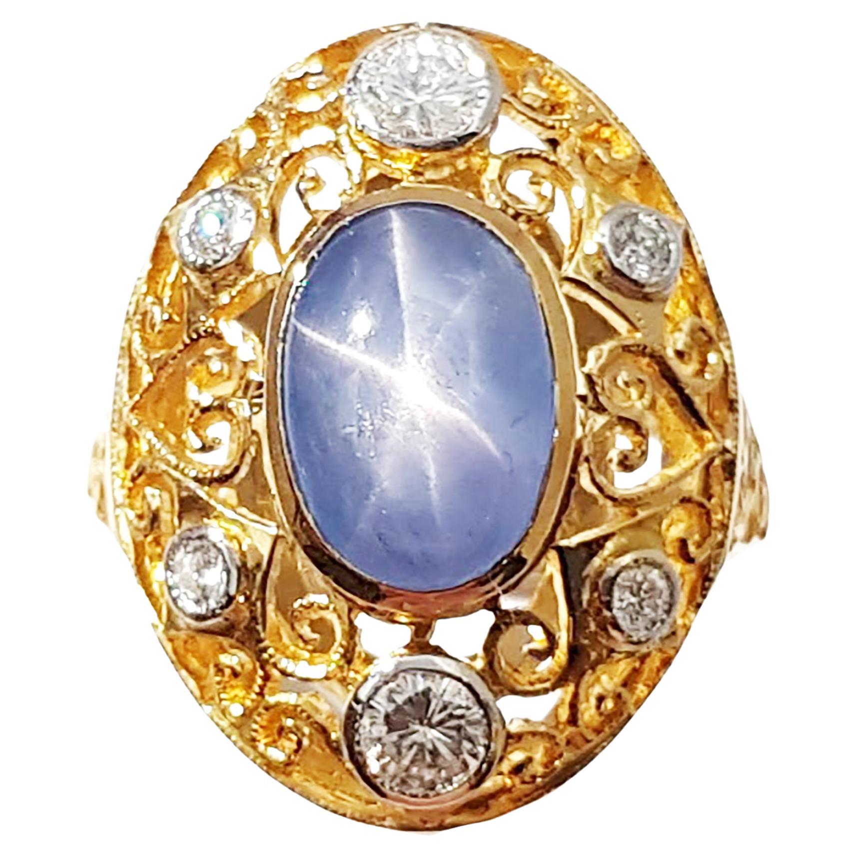 Blue Star Sapphire with Diamond Ring set in 14K Gold Settings