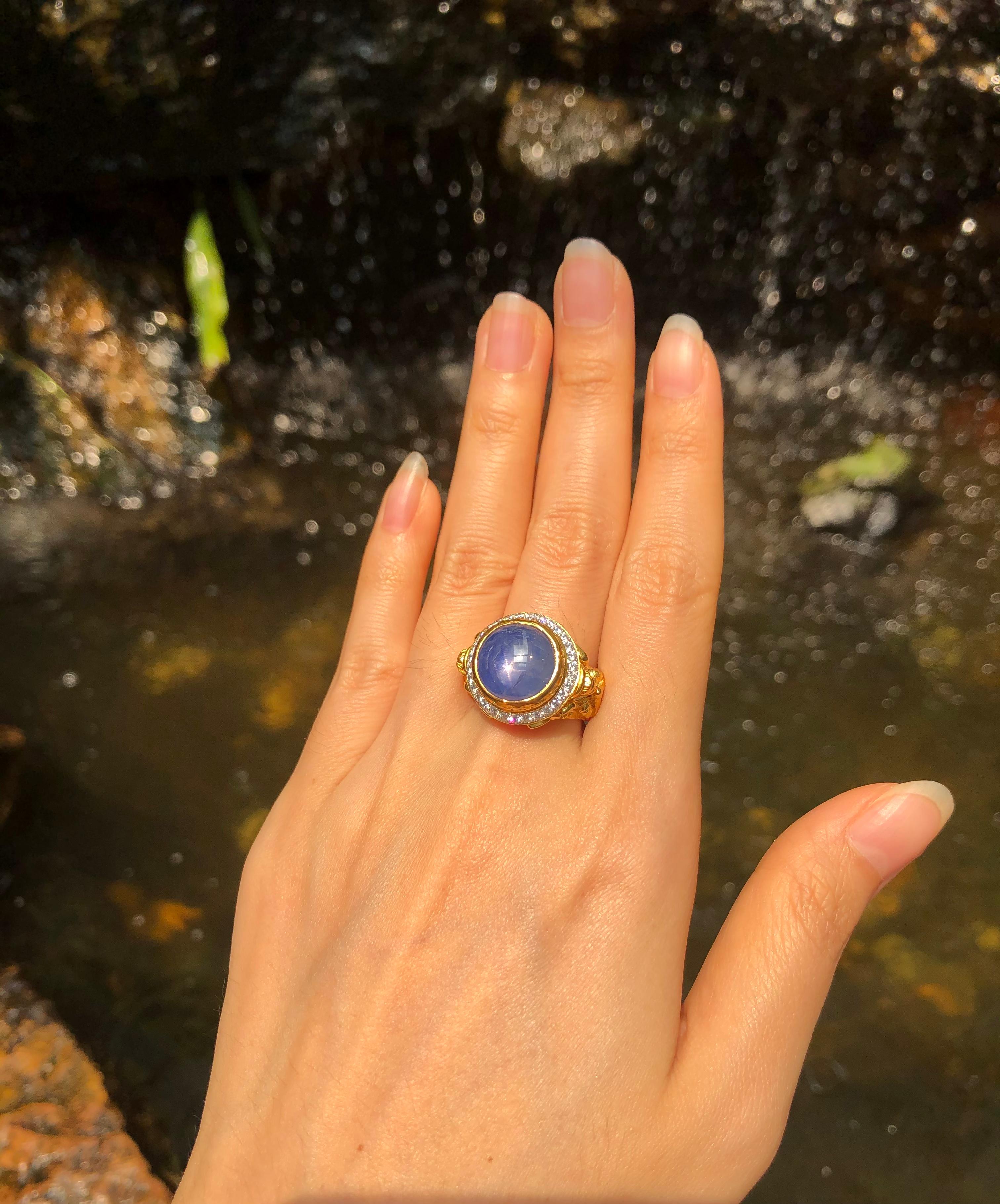 Blue Star Sapphire 12.76 carats with Diamond 0.49 carats Ring set in 18 Karat Gold Settings

Width:  1.9 cm 
Length: 1.9 cm
Ring Size: 53
Total Weight: 23.32grams

