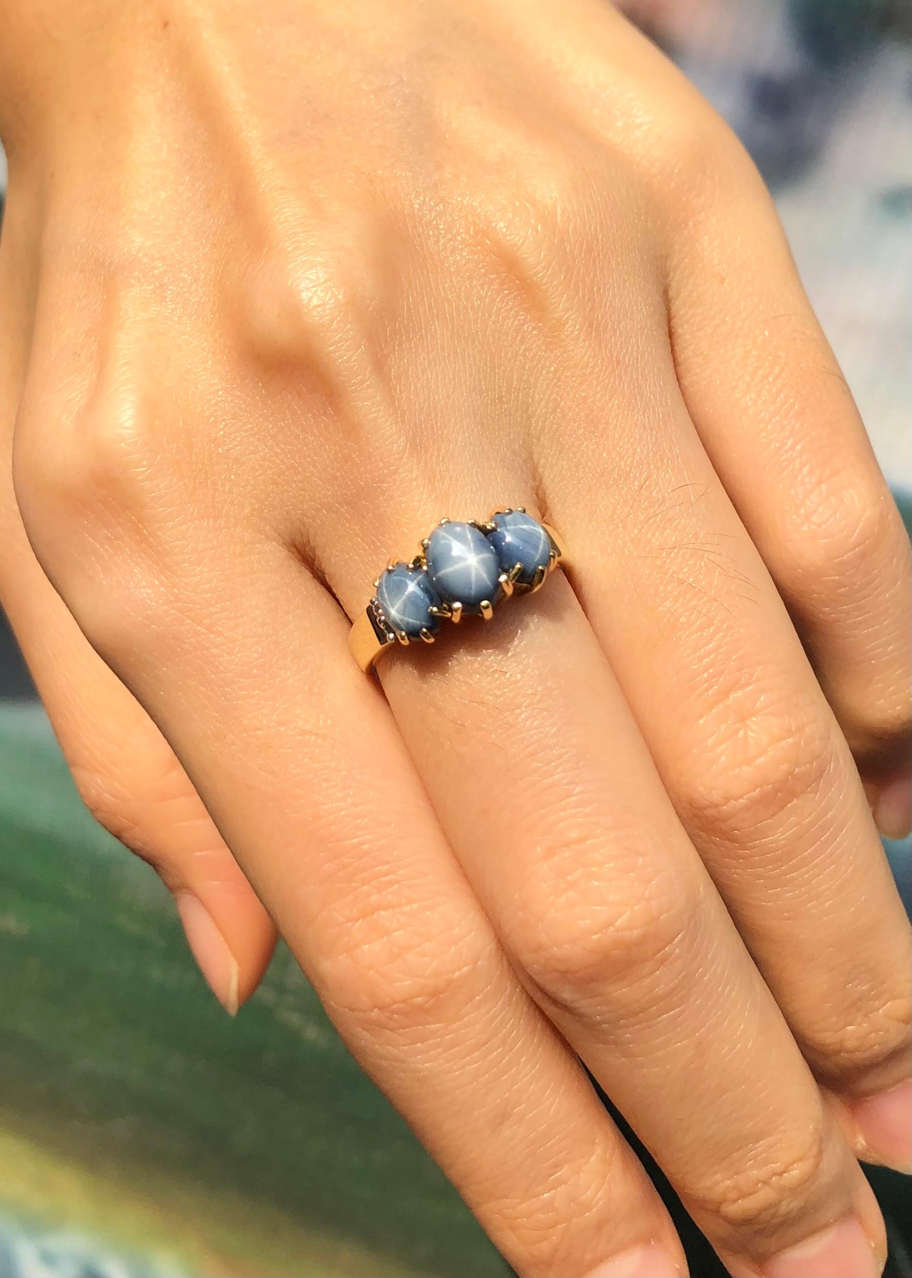 Contemporary Blue Star Sapphire with Diamond Ring set in 18 Karat Gold Settings For Sale