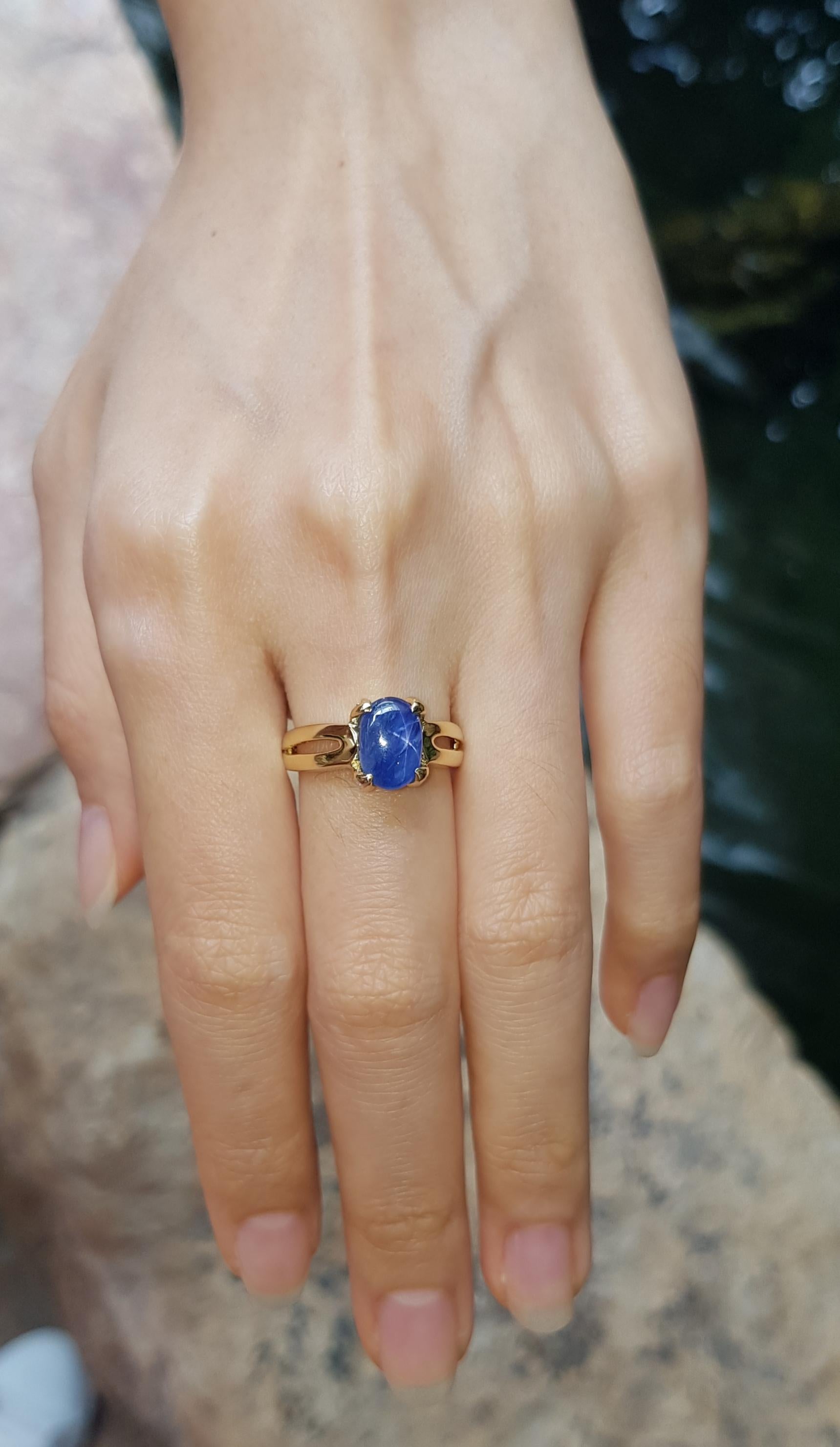 Cabochon Blue Star Sapphire with Diamond Ring Set in 18 Karat Gold Settings For Sale