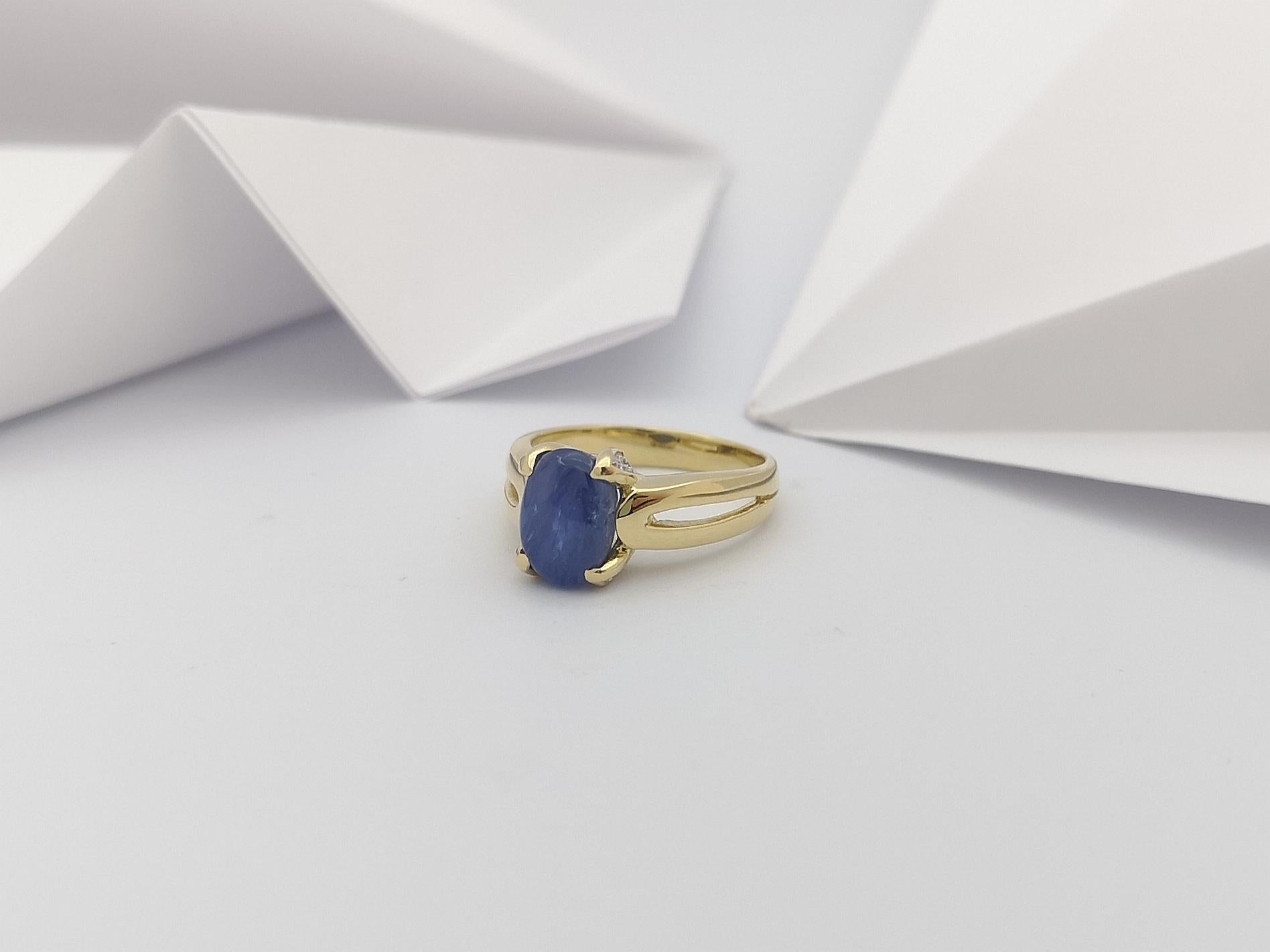 Bague en or 18 carats sertie d'un saphir étoilé bleu et de diamants en vente 3