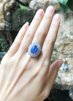 Blue Star Sapphire with Diamond Ring Set in 18 Karat White Gold Settings