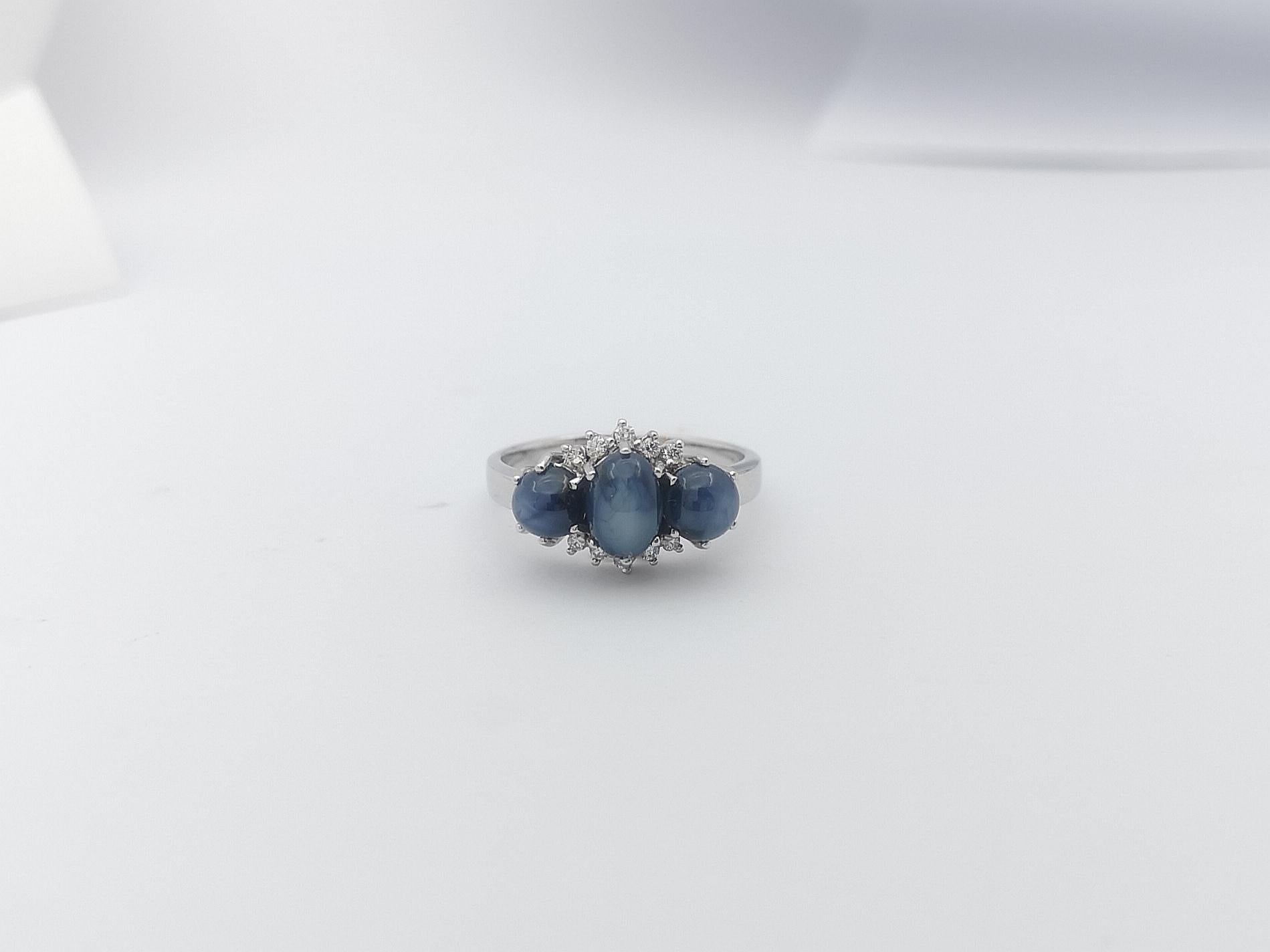 Women's or Men's Blue Star Sapphire with Diamond Ring Set in 18 Karat White Gold Settings For Sale