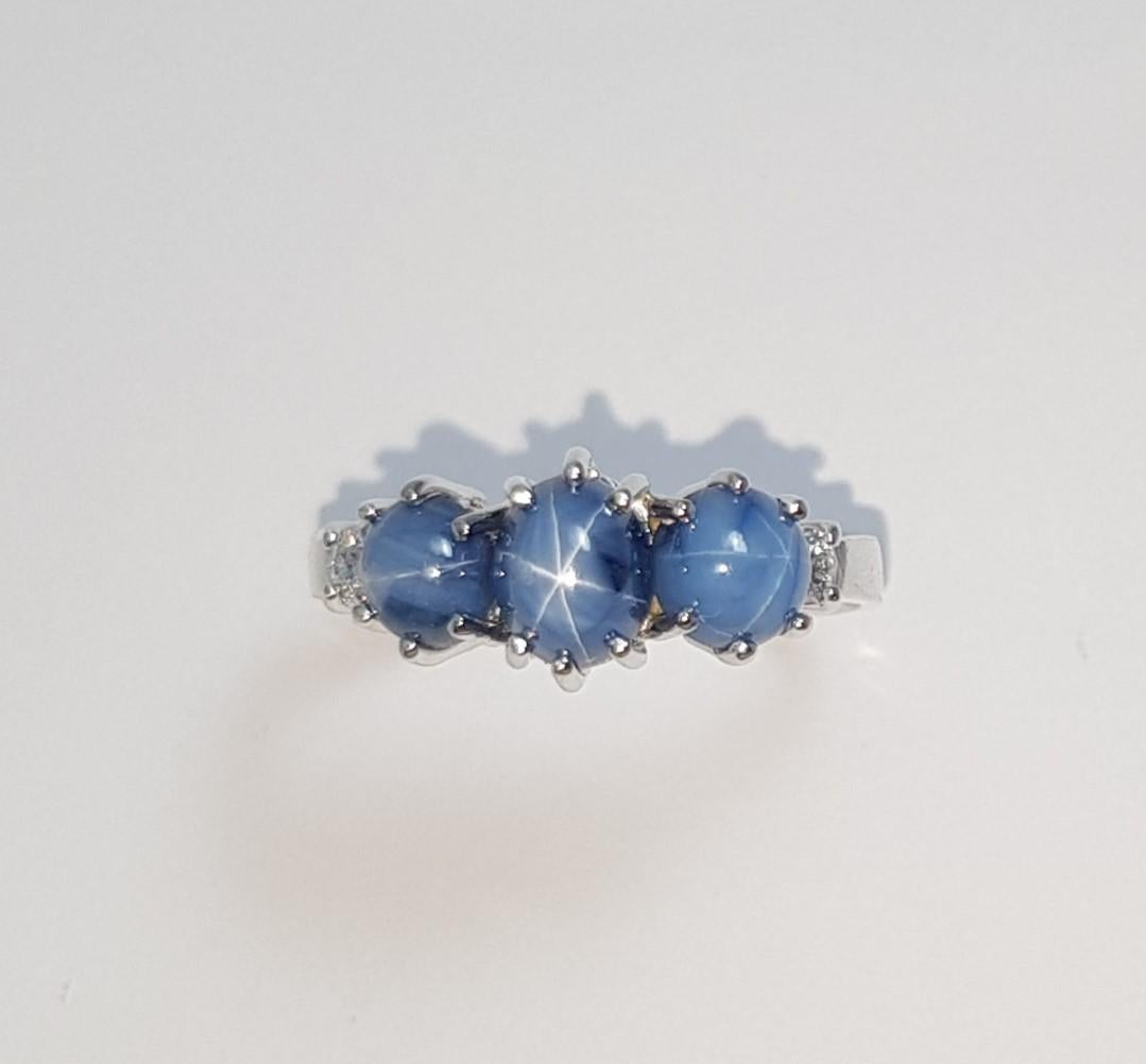 Blue Star Sapphire with Diamond Ring Set in 18 Karat White Gold Settings For Sale