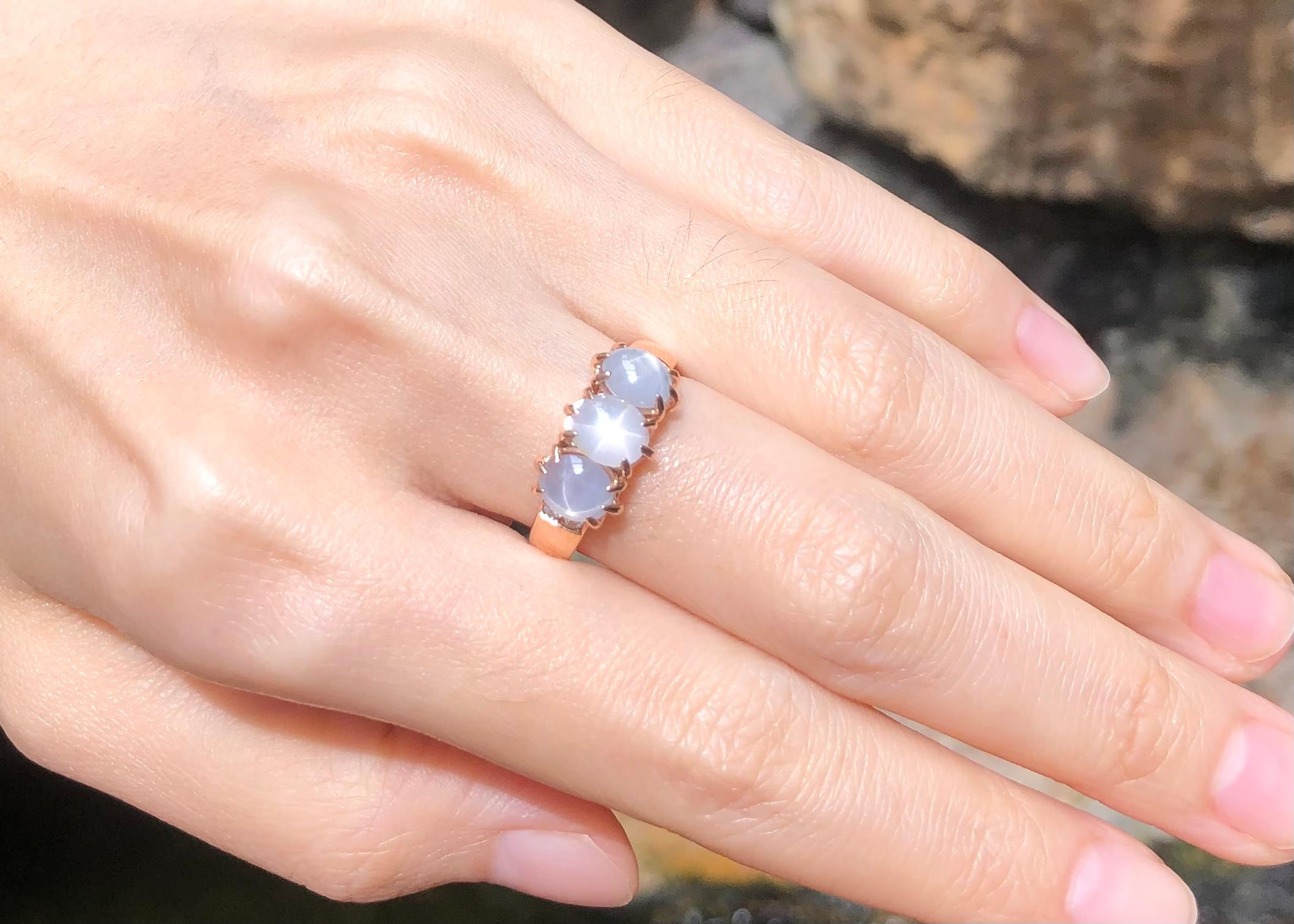 Contemporary Blue Star Sapphire with Diamond Ring set in 18K Rose Gold Settings For Sale