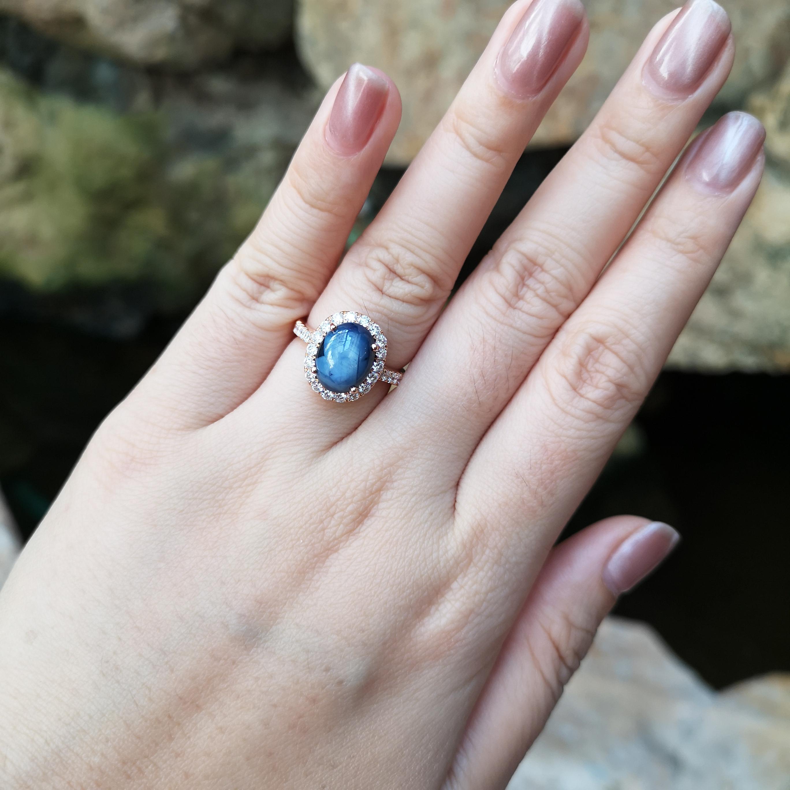 Contemporary Blue Star Sapphire with Diamond Ring set in 18K Rose Gold Settings For Sale