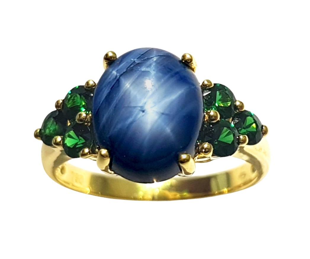 Women's Blue Star Sapphire with Tsavorite Ring set in 18K Gold Settings For Sale