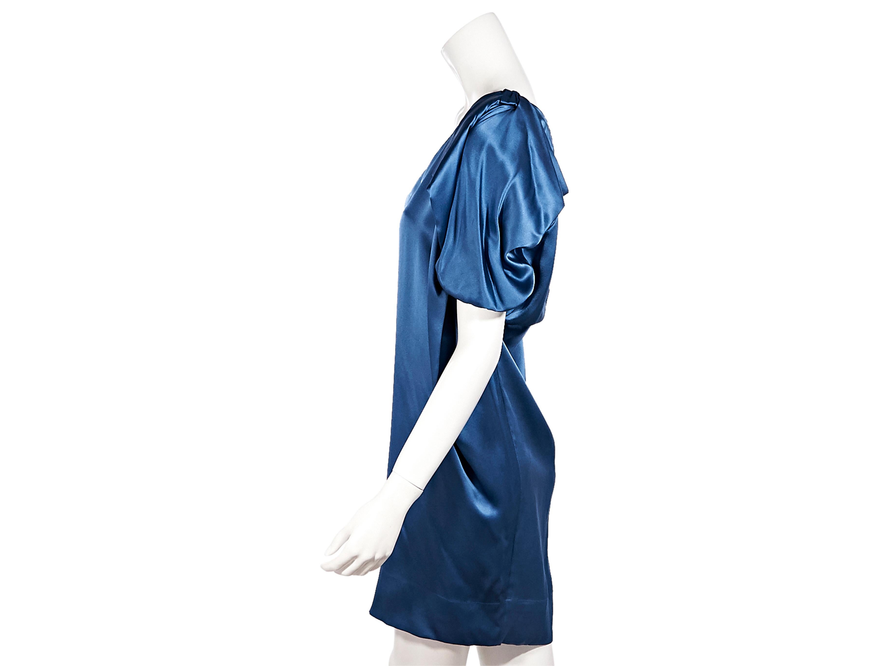 Product details:  Blue silk mini dress by Stella McCartney  Asymmetrical collar.  One-shoulder. Draped-detail at shoulder. Single blouson short sleeve.  Concealed zip-side closure.   Style with black patent leather pumps. Label size IT 40. 29.5