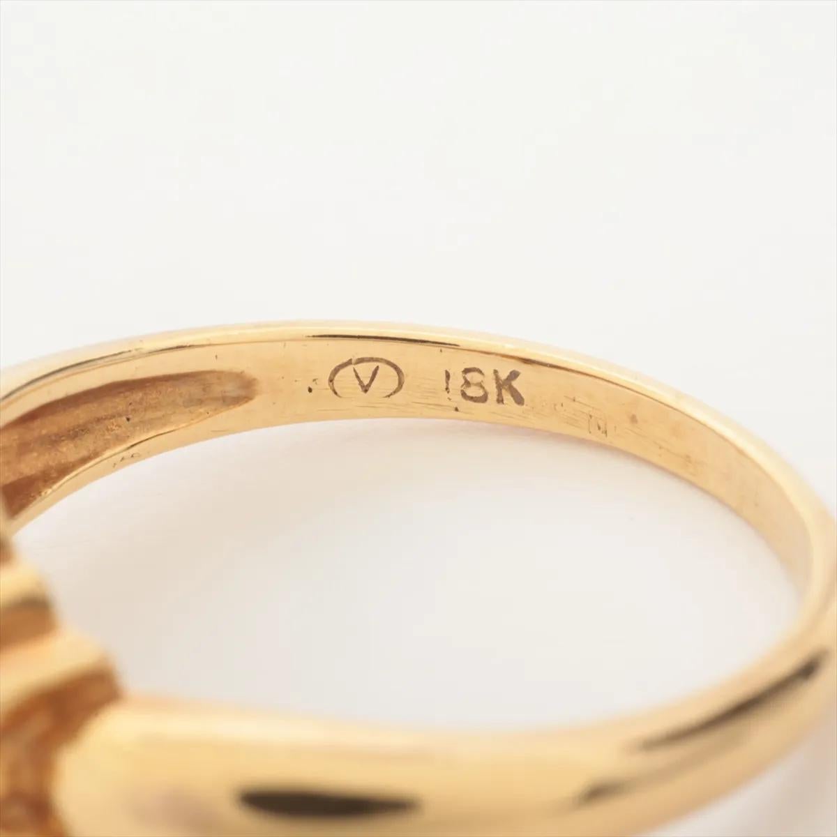 Donna Anello in oro con diamante e pietra blu in vendita