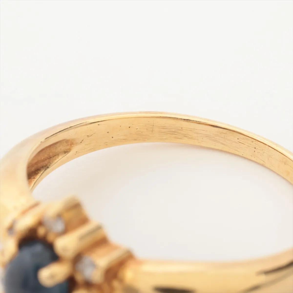 Anello in oro con diamante e pietra blu in vendita 1