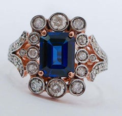 Blue Stone, Diamonds, Rose Gold and Silver Ring.