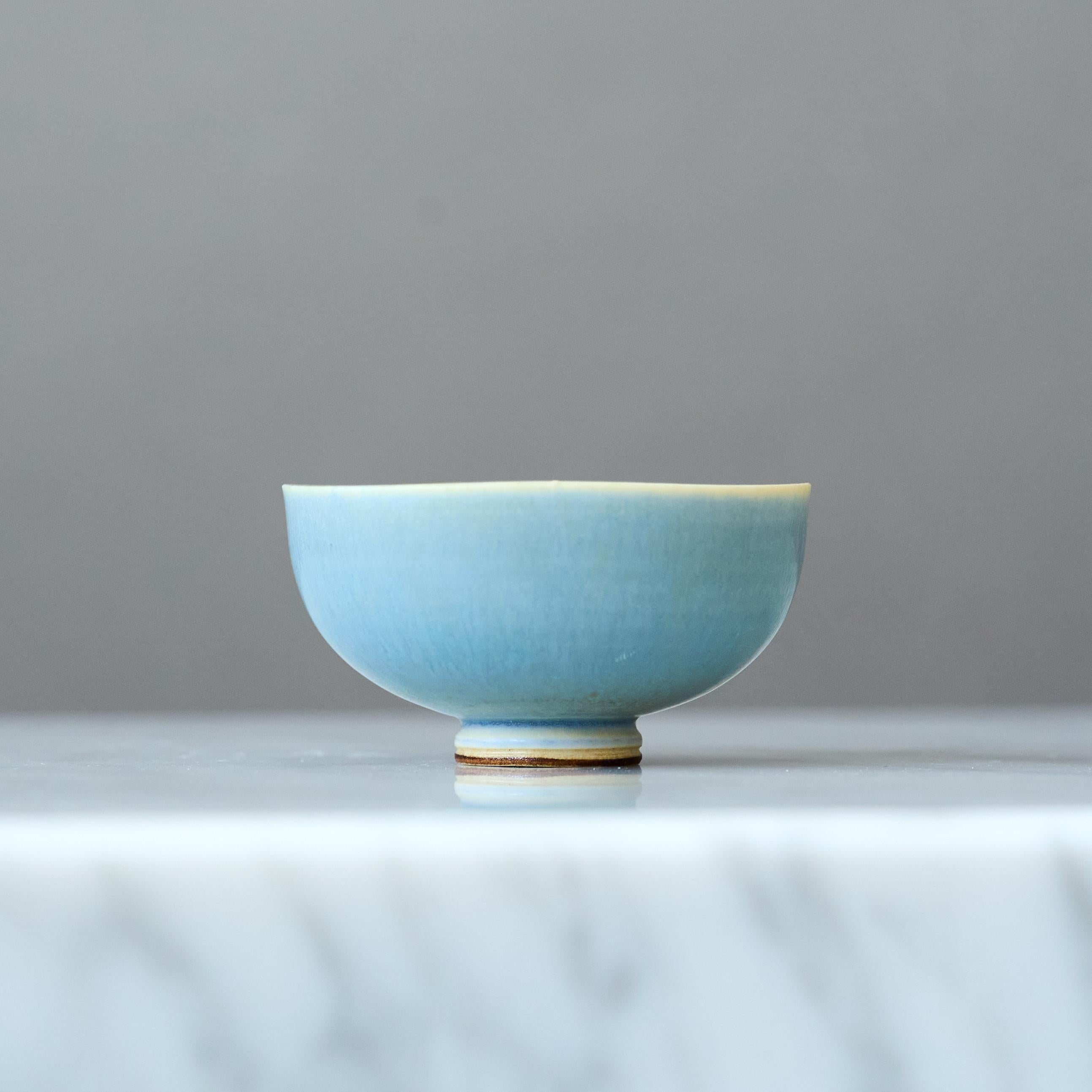 A beautiful miniature stoneware bowl with amazing blue hare’s fur glaze.
Made by master thrower Berndt Friberg, in the artist's studio at Gustavsberg, Sweden, 1960s.

Great condition. 
Incised signature 'Friberg' and Gustavsberg studio hand.

Berndt