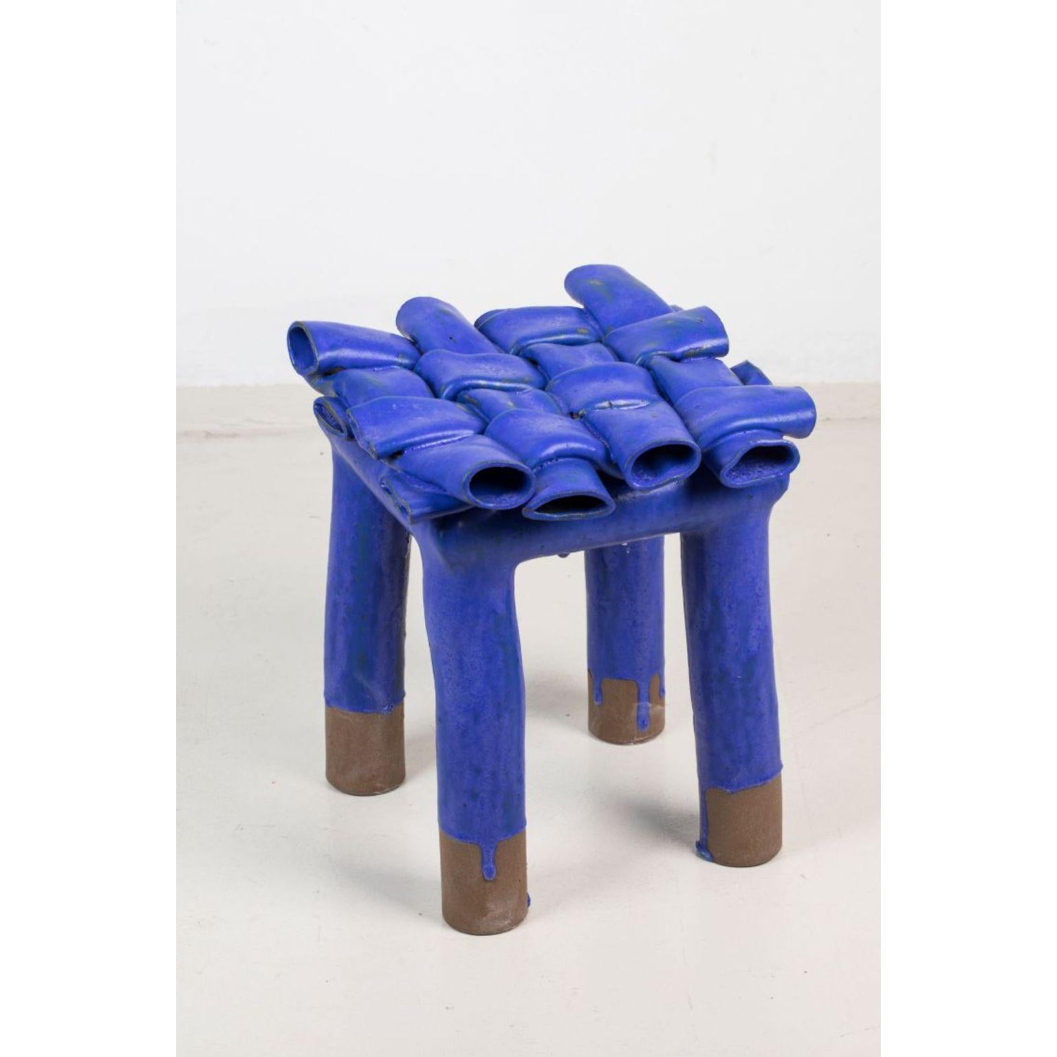 Blue stool by Milan Pekar
Dimensions: W40 x D40 x H42 cm
Materials: Glaze, clay

Hand-made in the Czech Republic

Also available: different colors and patterns.

Established own studio August 2009 – Focus mainly on porcelain, developing own