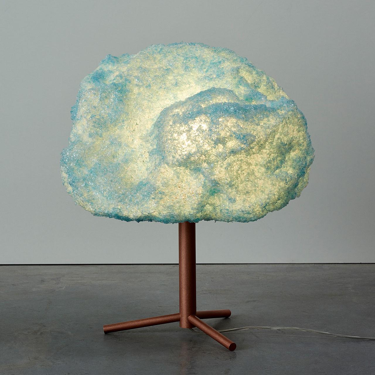 Blue Storm table light copper by Johannes Hemann
Material: Polycarbonate, Walnut
Dimensions: Ø 38 x H 45 cm

The Storm Series is by its concept the purest example of a process-design, where the designer seeks to set creative parameters to allow