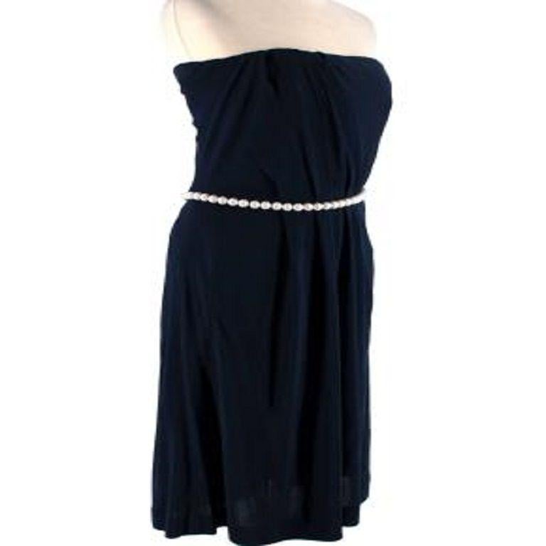 Chanel Blue Strapless Dress with Faux Pearl Belt
 

 - Strapless knee length dress
 - Attached faux pearl belt around waist 
 - Zipper closure on side of dress
 - Built in structure corset top 
 - Open pockets on each side 
 

 Materials 
 100%