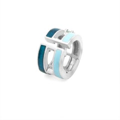 Boucle d'oreille manchette rayée bleue avec topaze