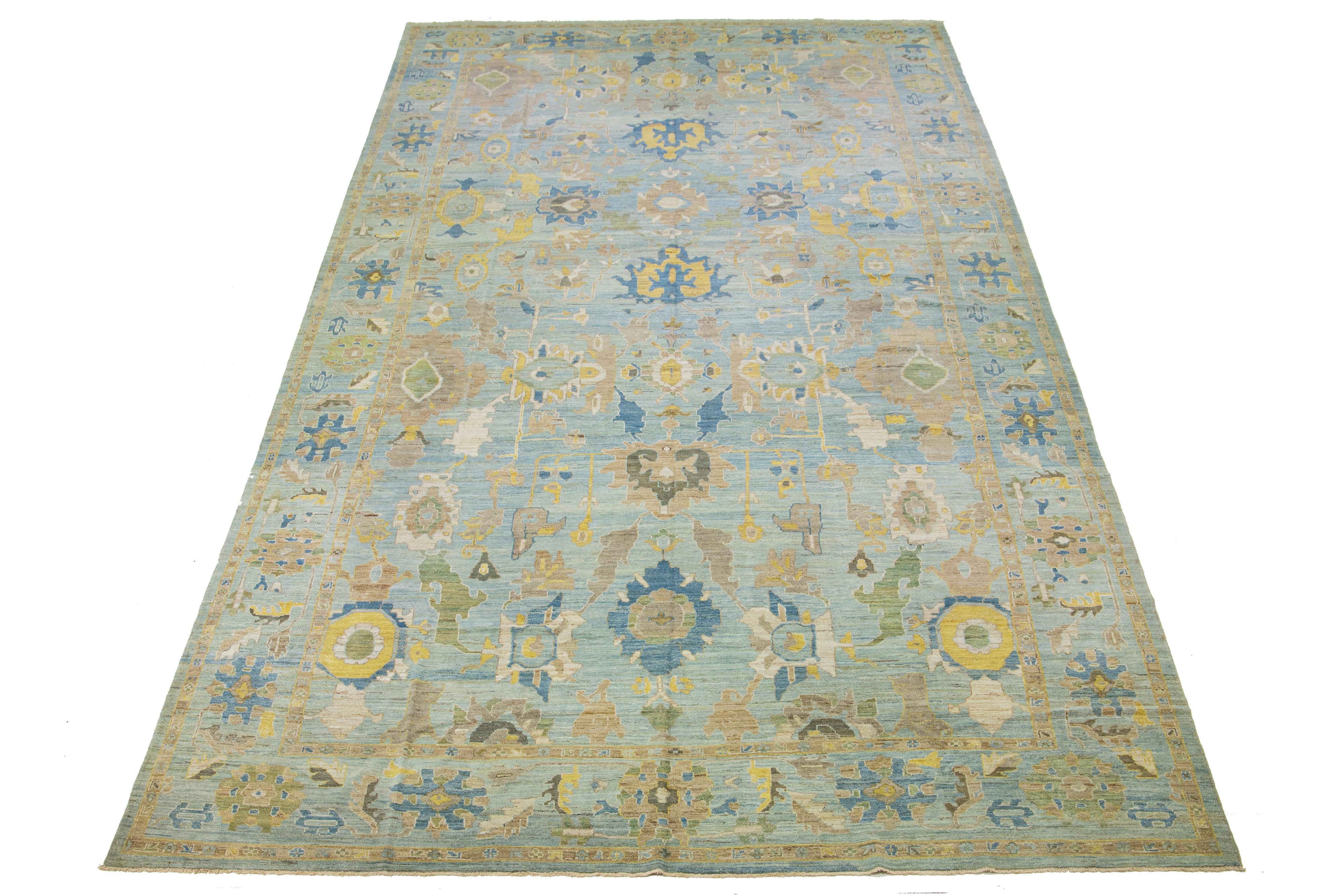 This Sultanabad classic style has been meticulously transformed into a contemporary masterpiece. Crafted with great care, this magnificent wool rug is light blue. Its all-over floral motif. To enhance its elegance, it incorporates a design of