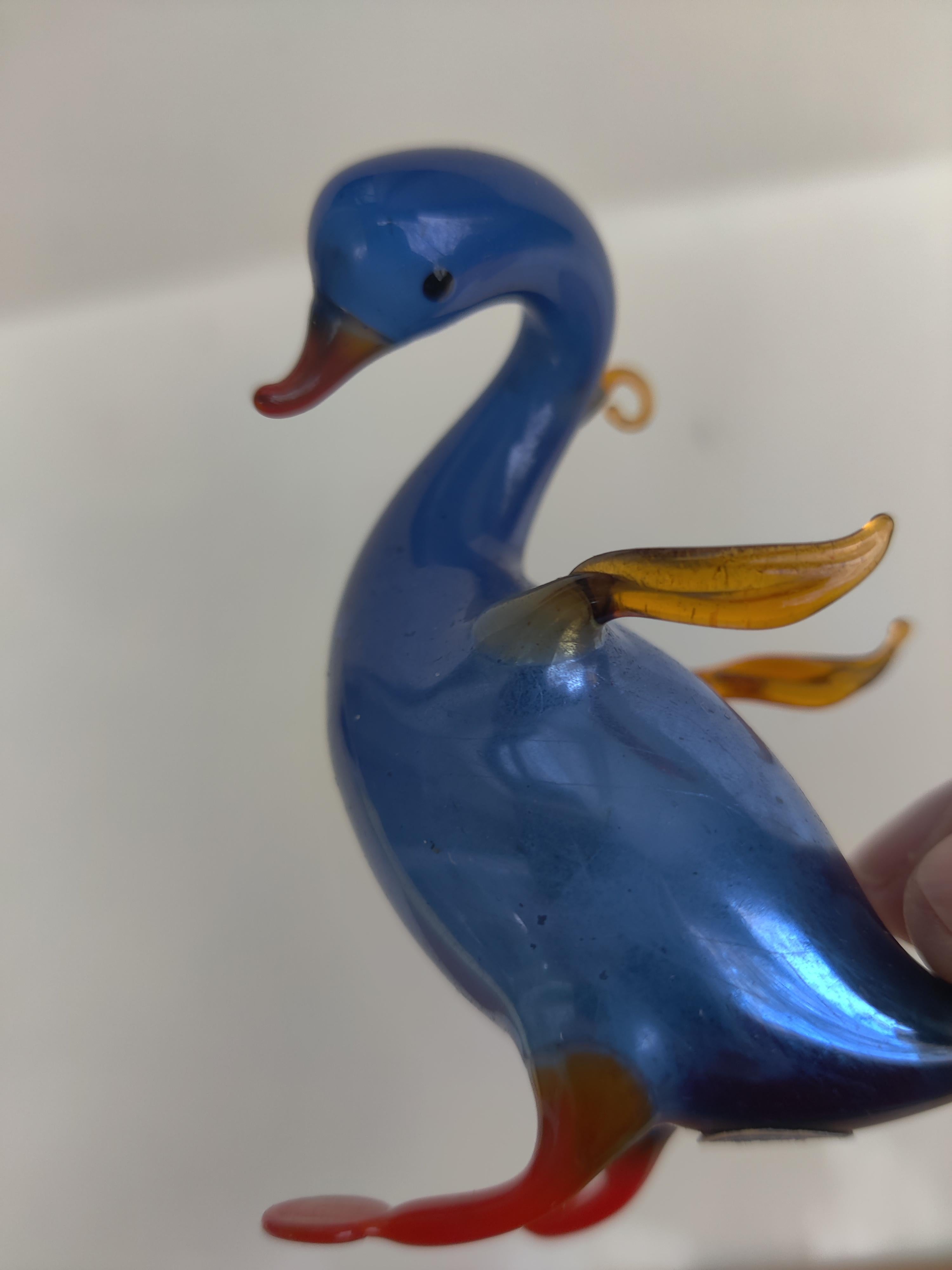 Blue Swan German Blown-Glass Ornament
Holder on back of neck for ornament hook.
Made in Germany sticker on bottom. 