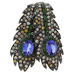 Colgante de oro rosa de 18 quilates con tanzanita azul, granate verde y diamante fantasía