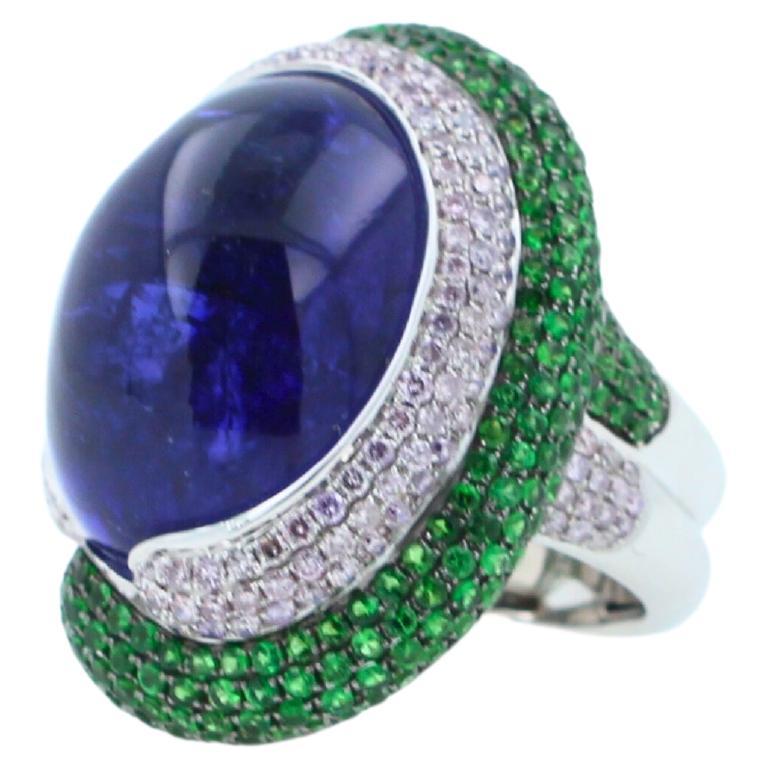 Women's or Men's Blue Tanzanite Oval Cabochon Diamonds Tsavorites Pave 18k White Gold Unique Ring For Sale