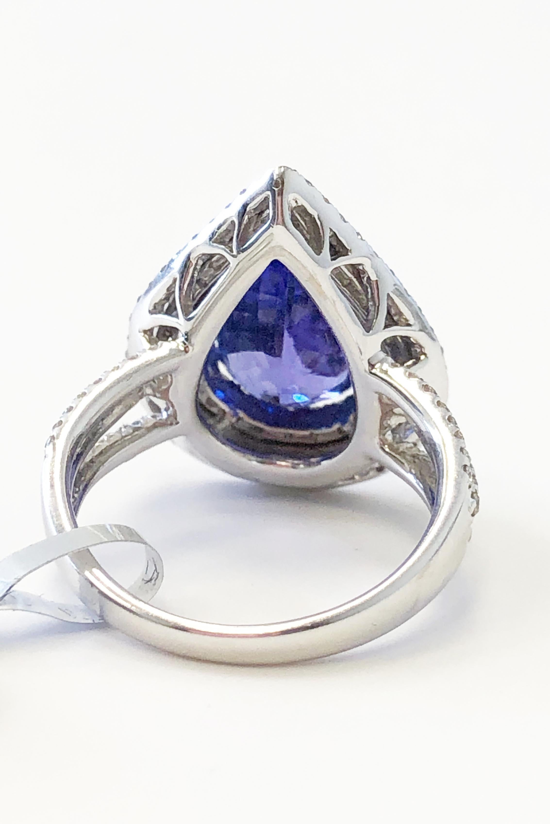 Women's or Men's Blue Tanzanite Pear Shape and White Diamond Round Cocktail Ring in 18 Karat