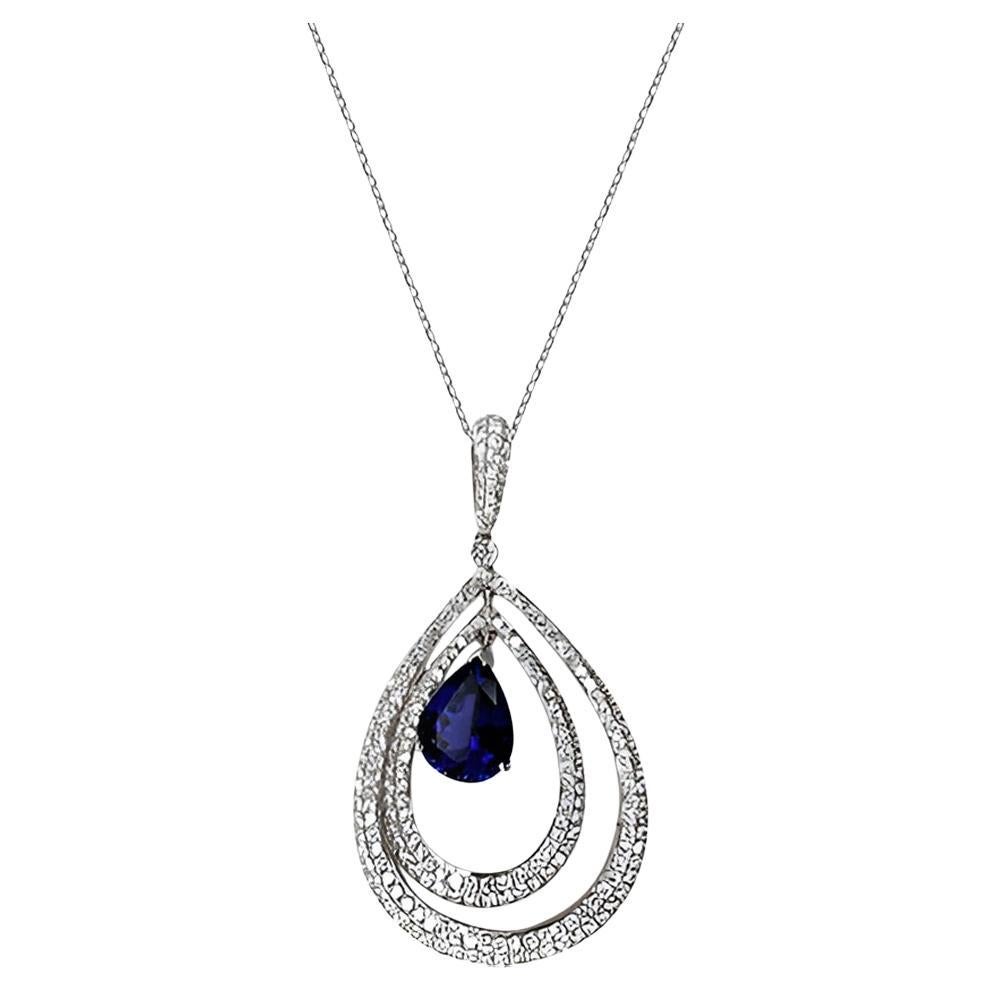 Collier pendentif en or blanc 18 carats Tanzanite bleue et diamant blanc en vente