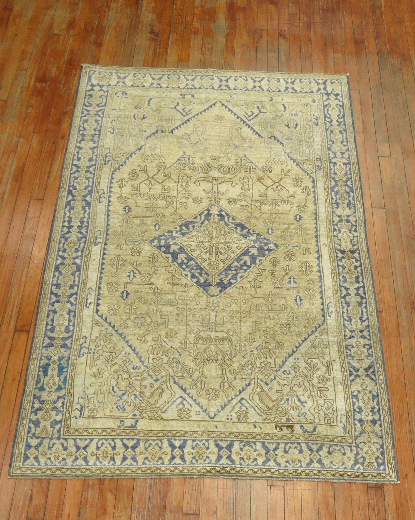 20th century intermediate size traditional rug in blue and taupe tones

Measures: 4'6