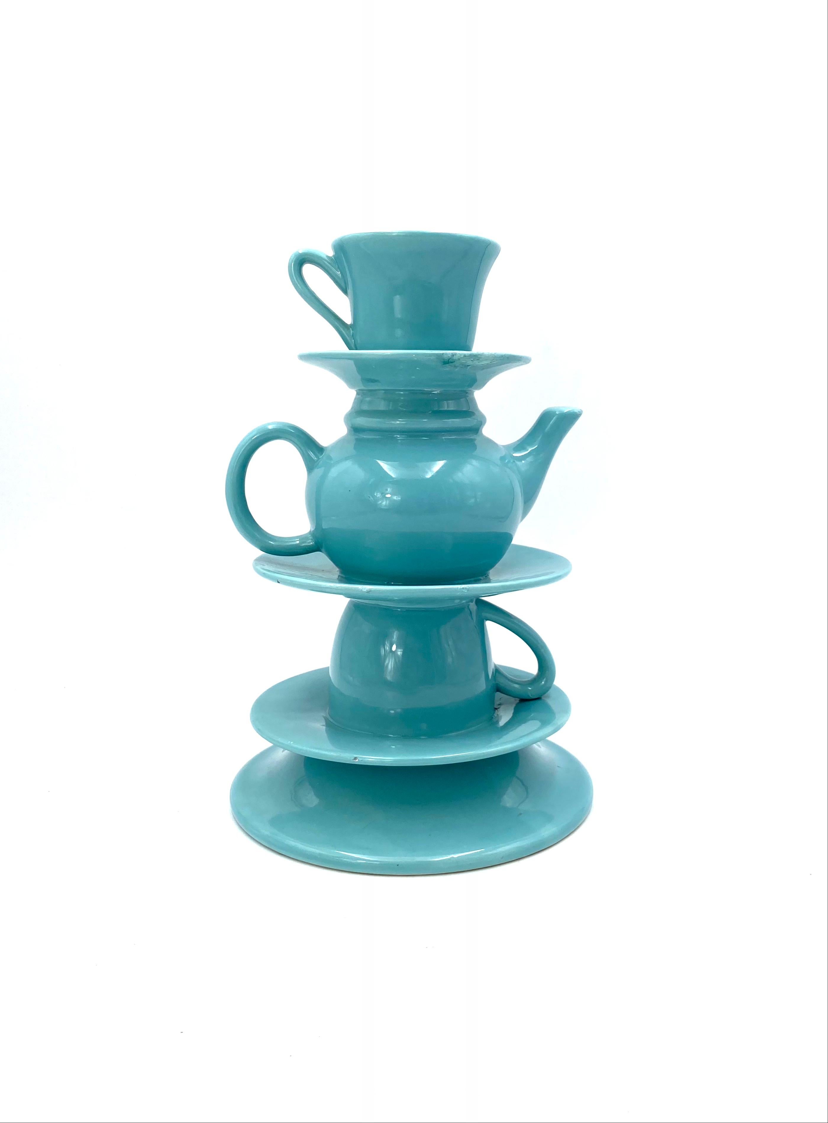 Blue tea cups stack vase

Italy 1980s

Measures : 31 cm H - 20 cm diam.

Conditions: defects & repairs. Check the pictures.