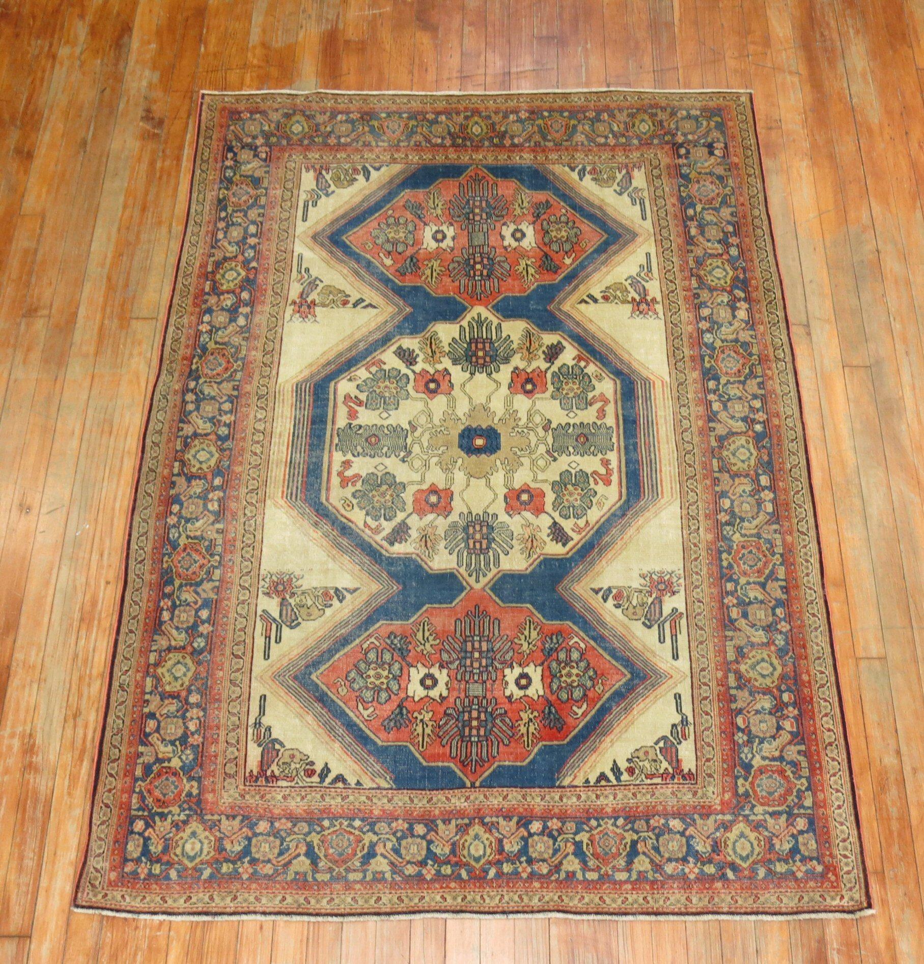 An authentic early 20th century tribal Persian Senneh rug. 

Antique Senneh rugs are one of the most distinctive of all Persian rugs. Even though the designs are often copied by Bidjar Rugs and Tabriz Rugs but just touching the rugs. Antique
