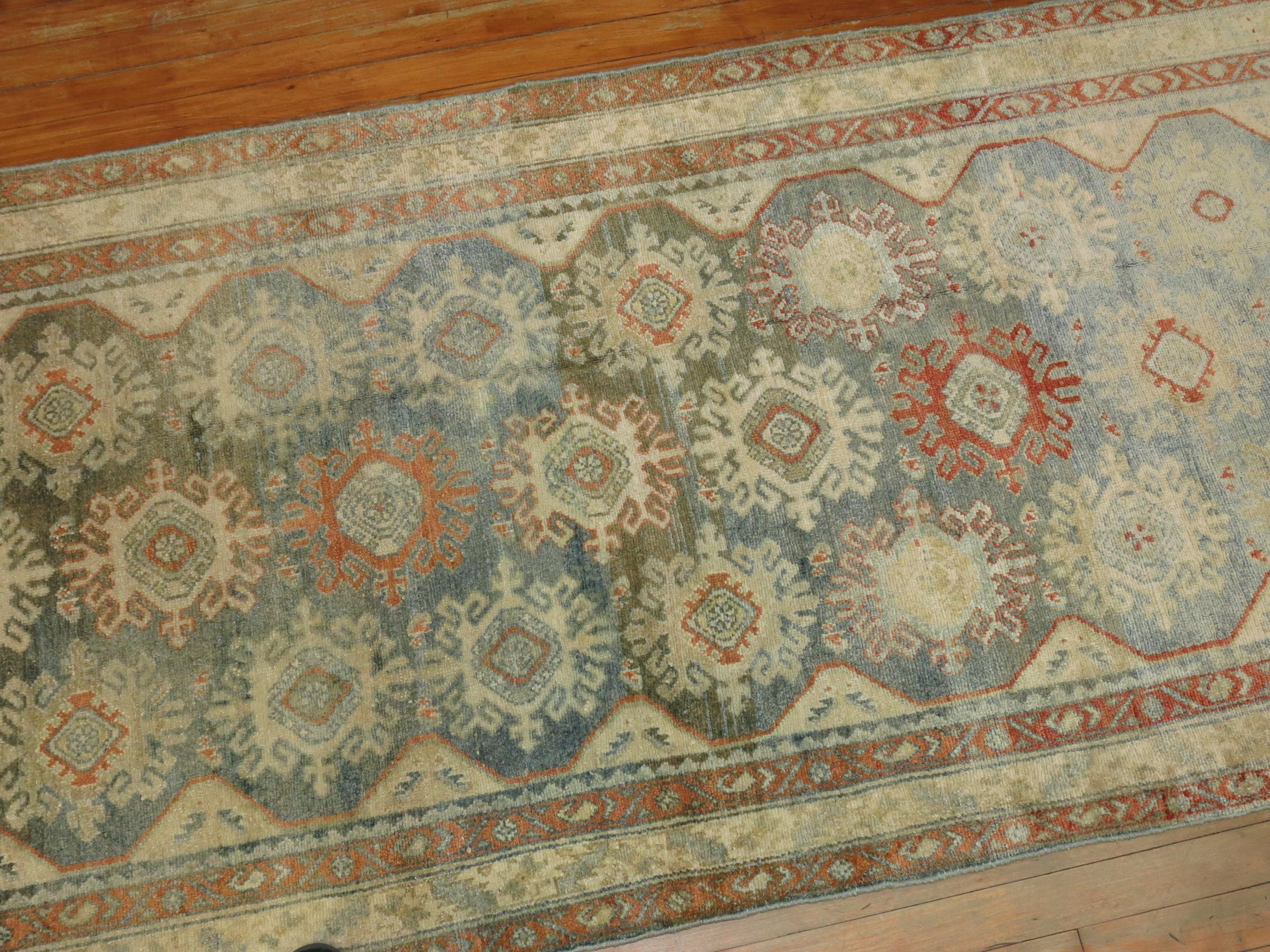 Predominant soft gray-blue and terracotta Persian Malayer Runner from the early 20th century.

Measures: 3'4