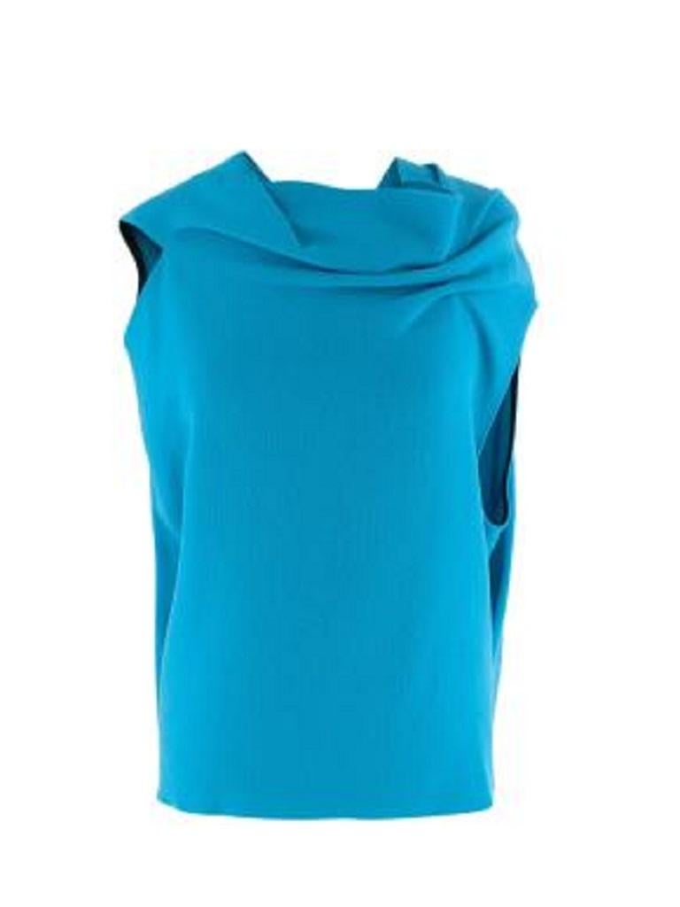 Roland Mouret Blue Textured Crepe Tie-Back Draped Top
 
 - Draped sleeveless top features an asymmetric neckline and hem 
 - Open back with tie detailing and ruched stitching at the neck 
 
 Materials 
 100% Wool 
 
 Made In the UK 
 Dry Clean Only