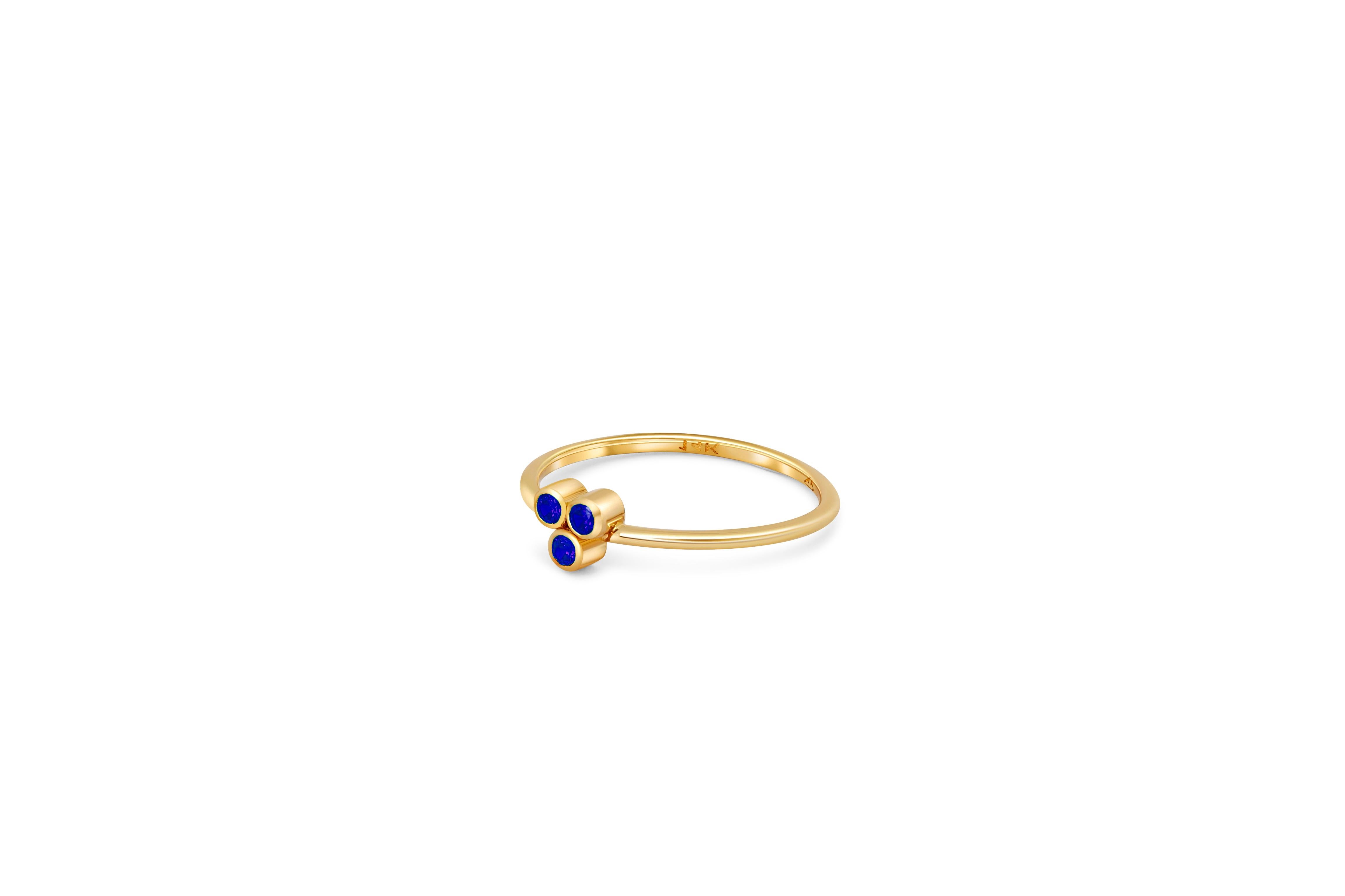 Modern Blue Three Stone 14k gold ring. For Sale