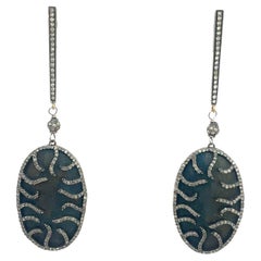 Orecchini Paradizia in titanio blu con pavé di diamanti