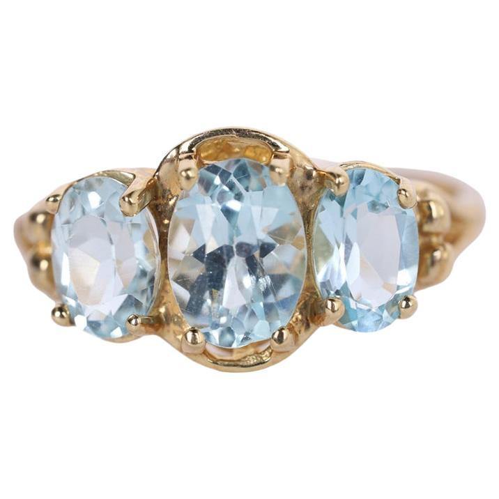 Three Oval Stone Blue Topaz Yellow Gold Ring Size 6.75  For Sale
