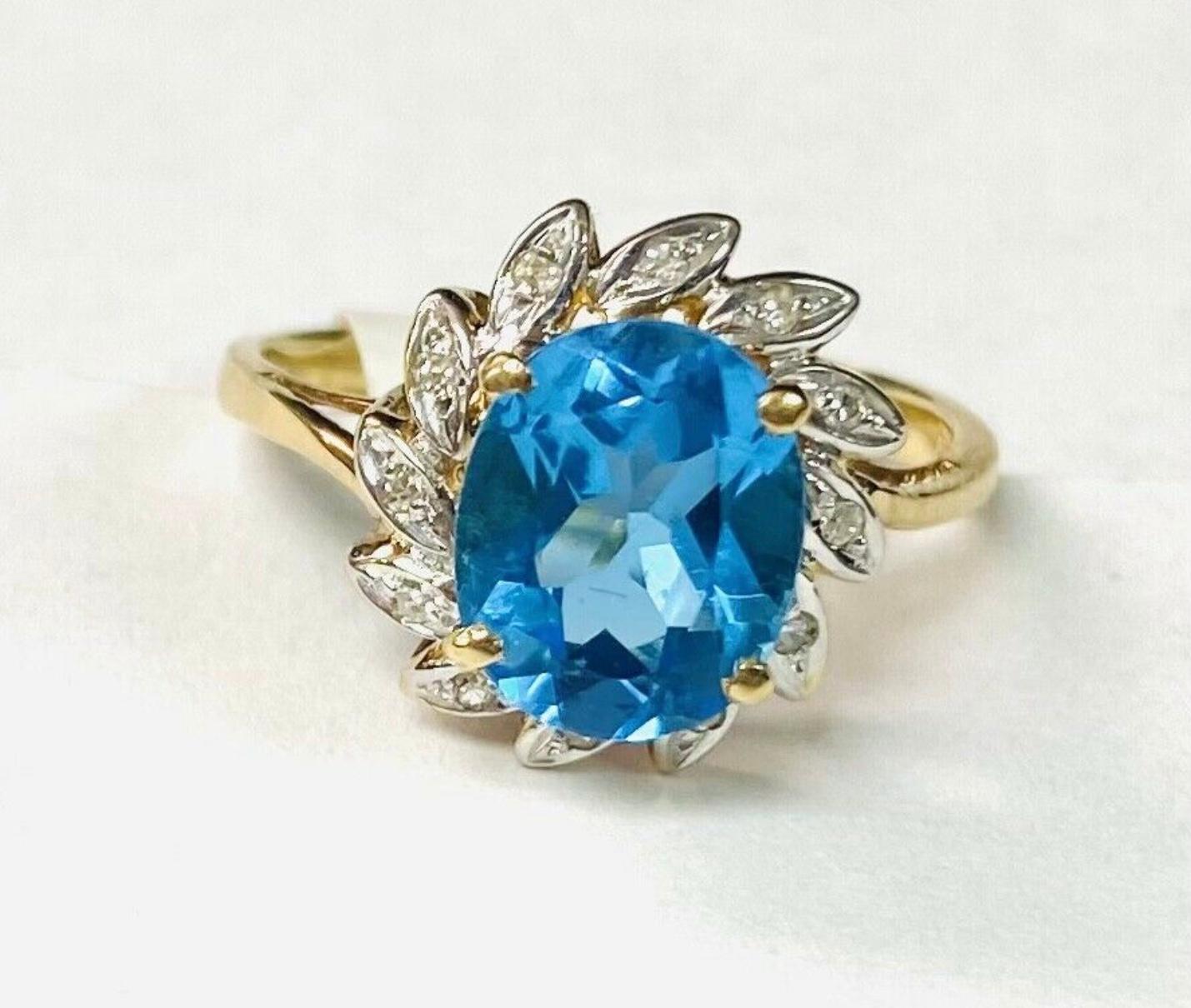 Modern Blue Topaz 14K Yellow Gold and Diamond Ring For Sale
