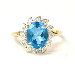 Anillo Topacio Azul Oro Amarillo 14K y Diamantes