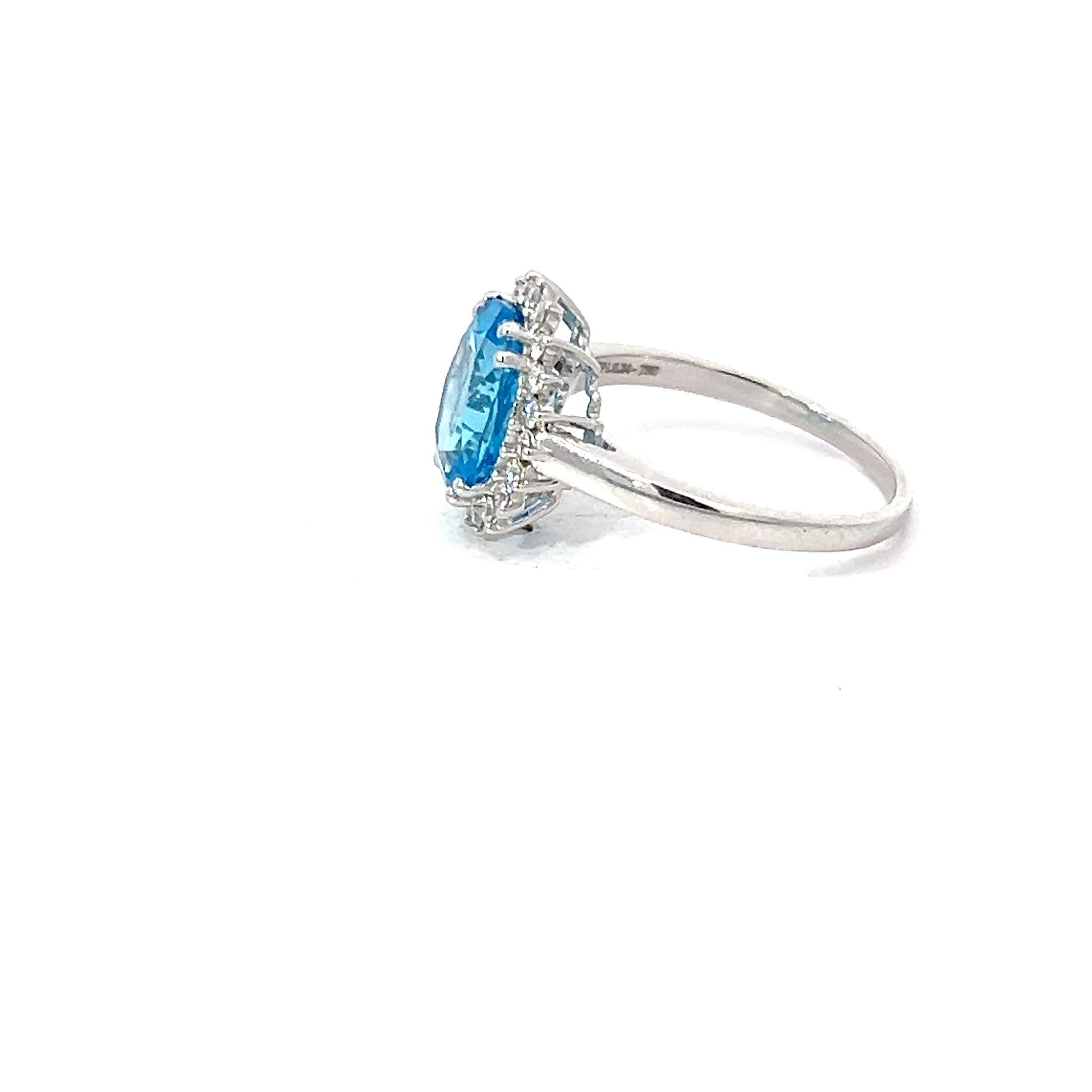 Blue Topaz 3 Carat Oval 0.24 Carat Round Diamond Platinum Halo Bespoke Ring For Sale 4
