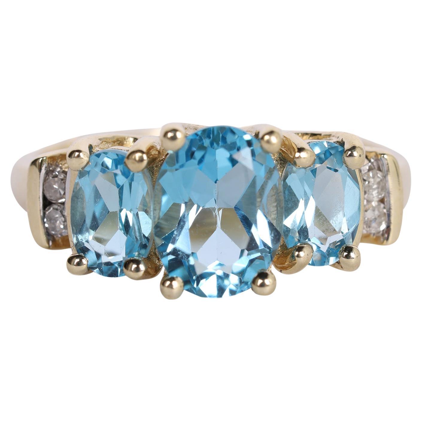 Anello blu TOPAZ con 3 pietre passato presente futuro 10k