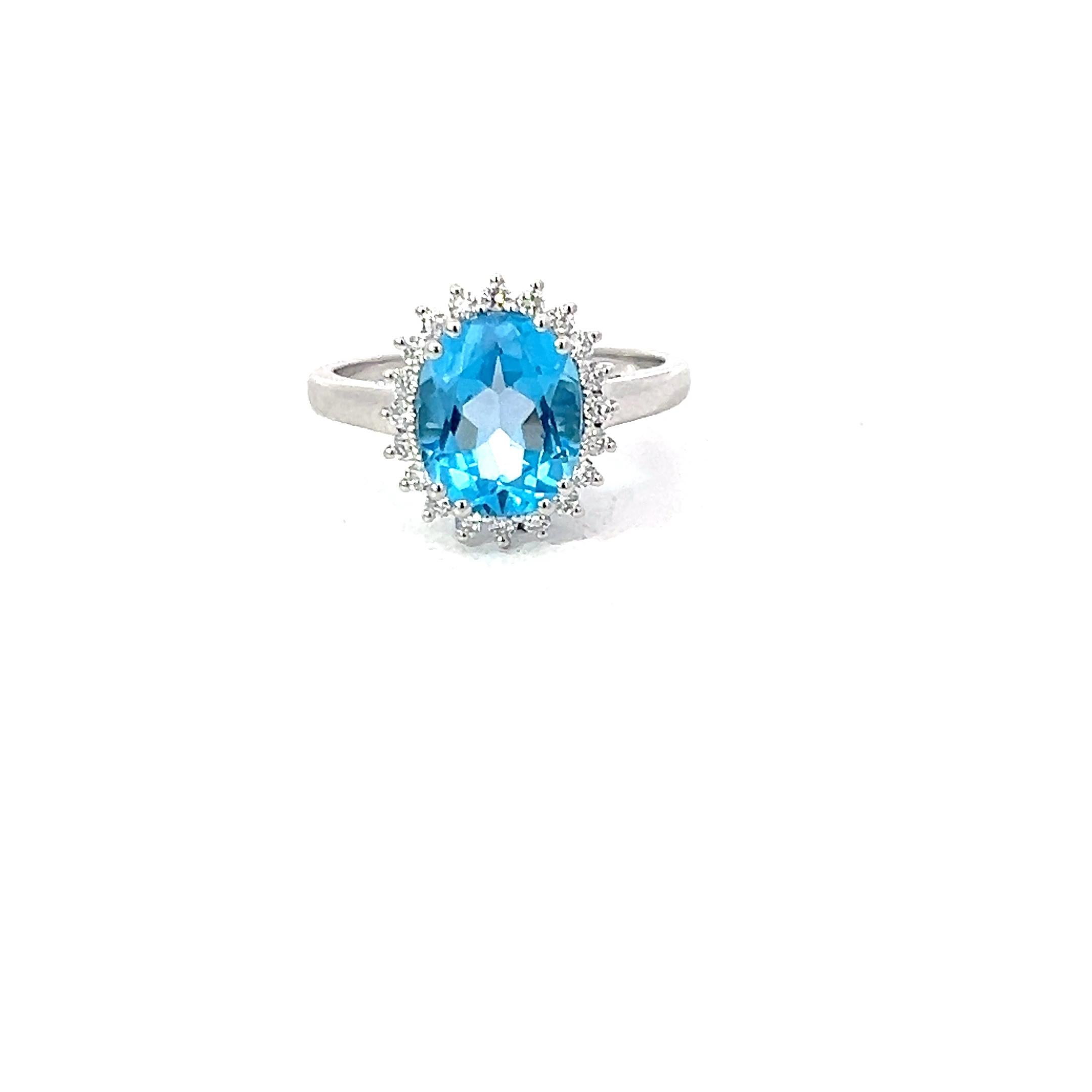 Blue Topaz 3.13 Carat Oval 0.24 Carat Round Diamond 18 KT White Gold Halo Ring For Sale 4