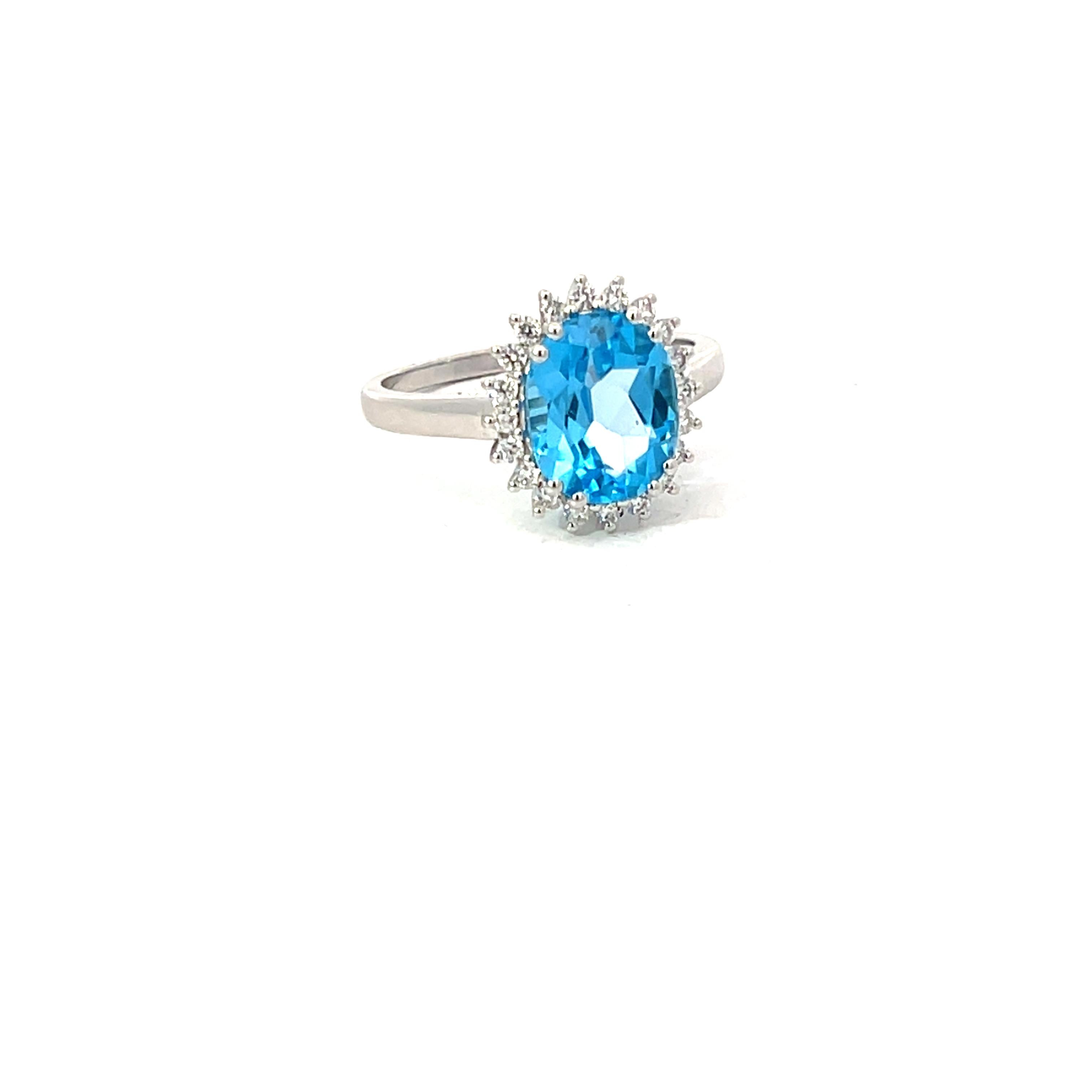 Blue Topaz 3.13 Carat Oval 0.24 Carat Round Diamond 18 KT White Gold Halo Ring For Sale 8