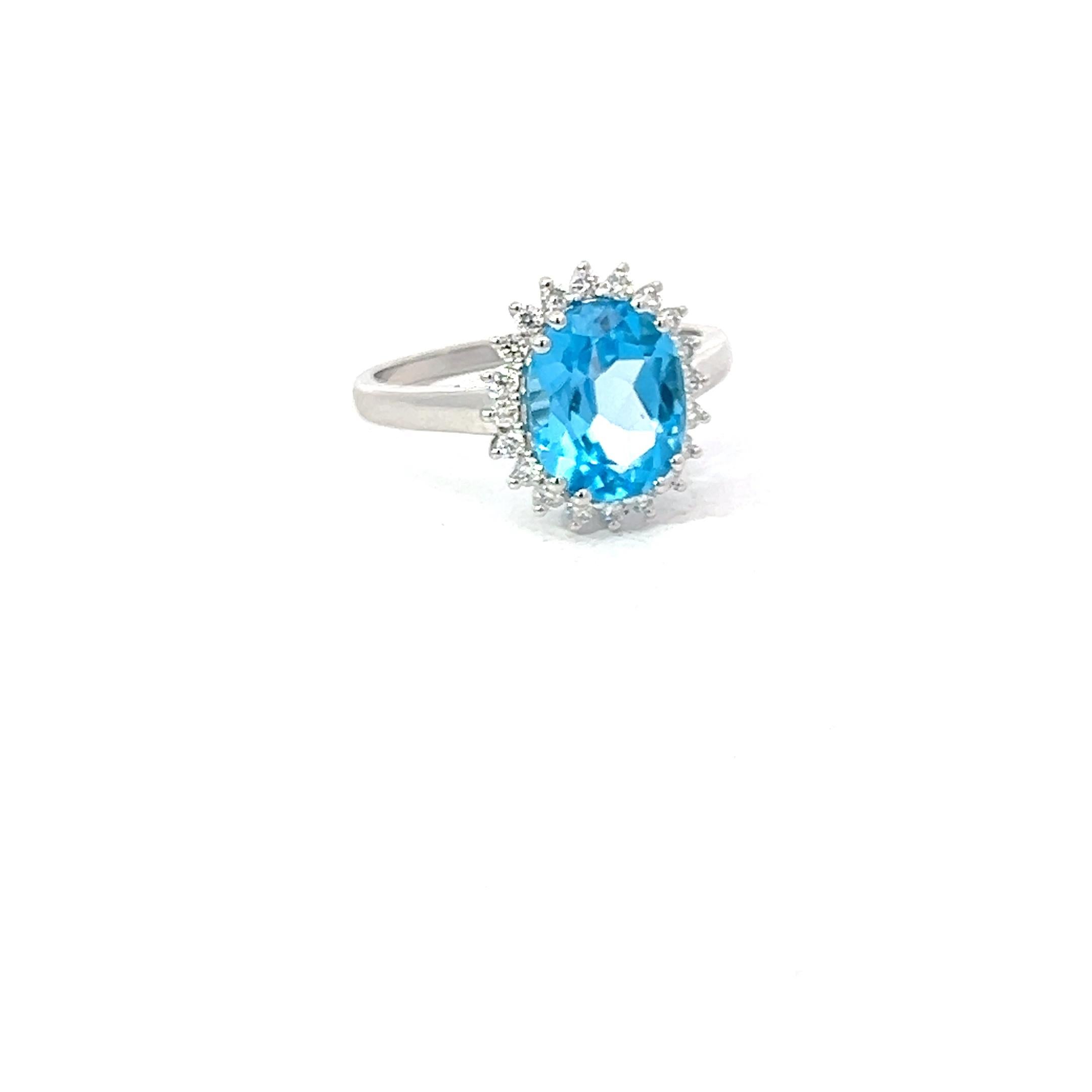 Blue Topaz 3.13 Carat Oval 0.24 Carat Round Diamond 18 KT White Gold Halo Ring For Sale 1