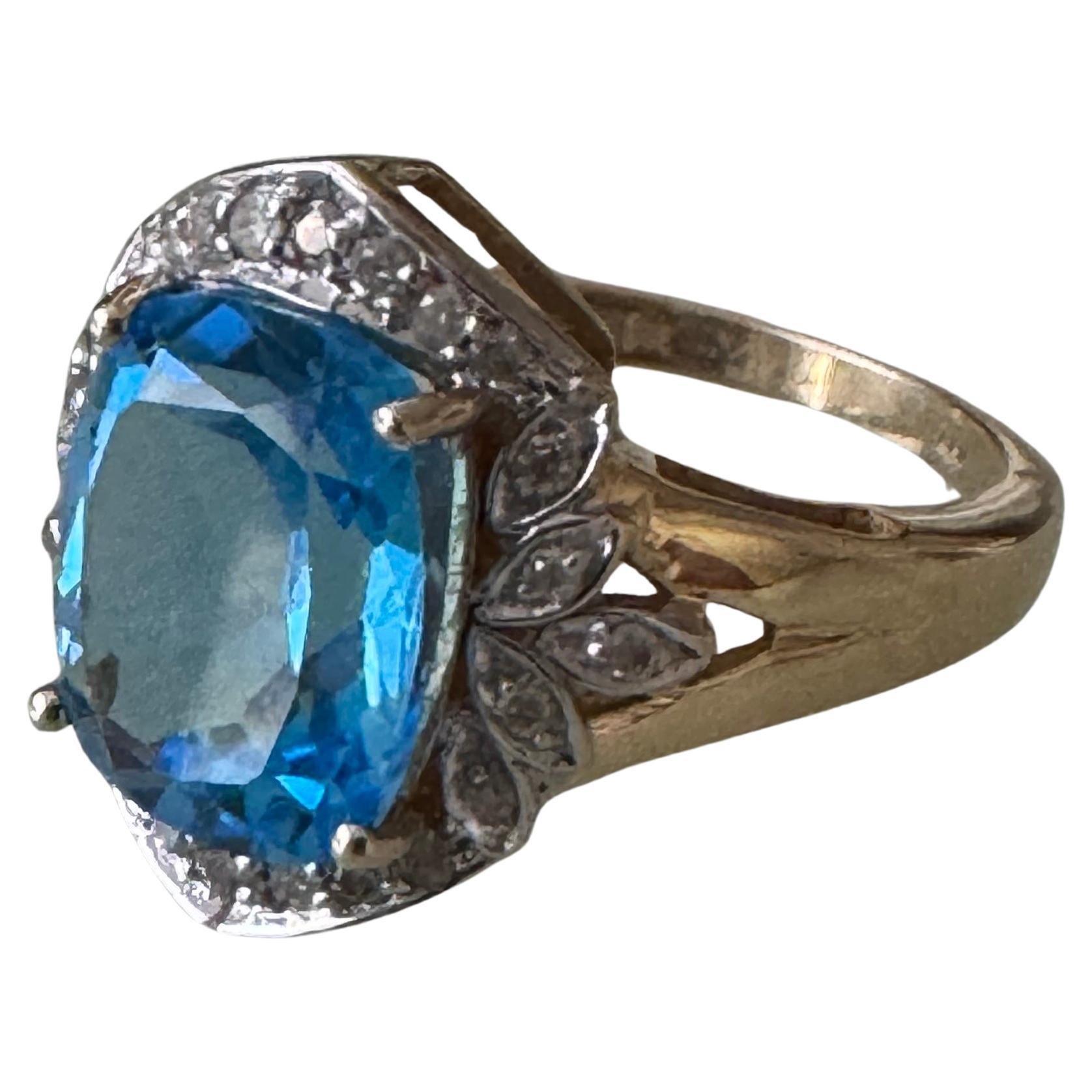 Blue Topaz Diamond 14K Gold Ring
Fabulous handcrafted oval blue natural topaz about 4.37 carat surrounded with sparkling natural white round diamonds 0.26 carats. Mounted in white and yellow 14k gold about 4.7 grams. Ring size 6.75