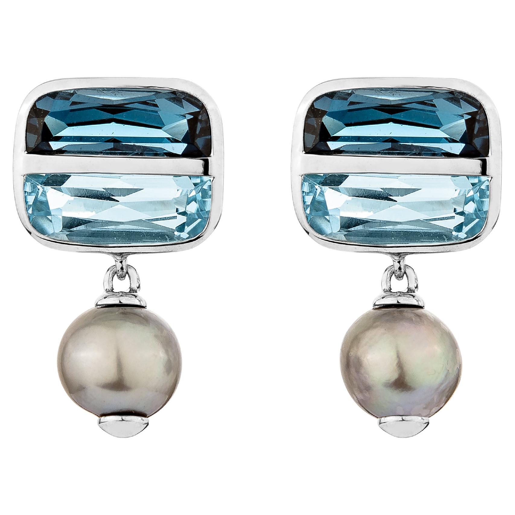 Boucles d'oreilles en gouttes en or blanc 18 carats avec topaze bleue 8R.