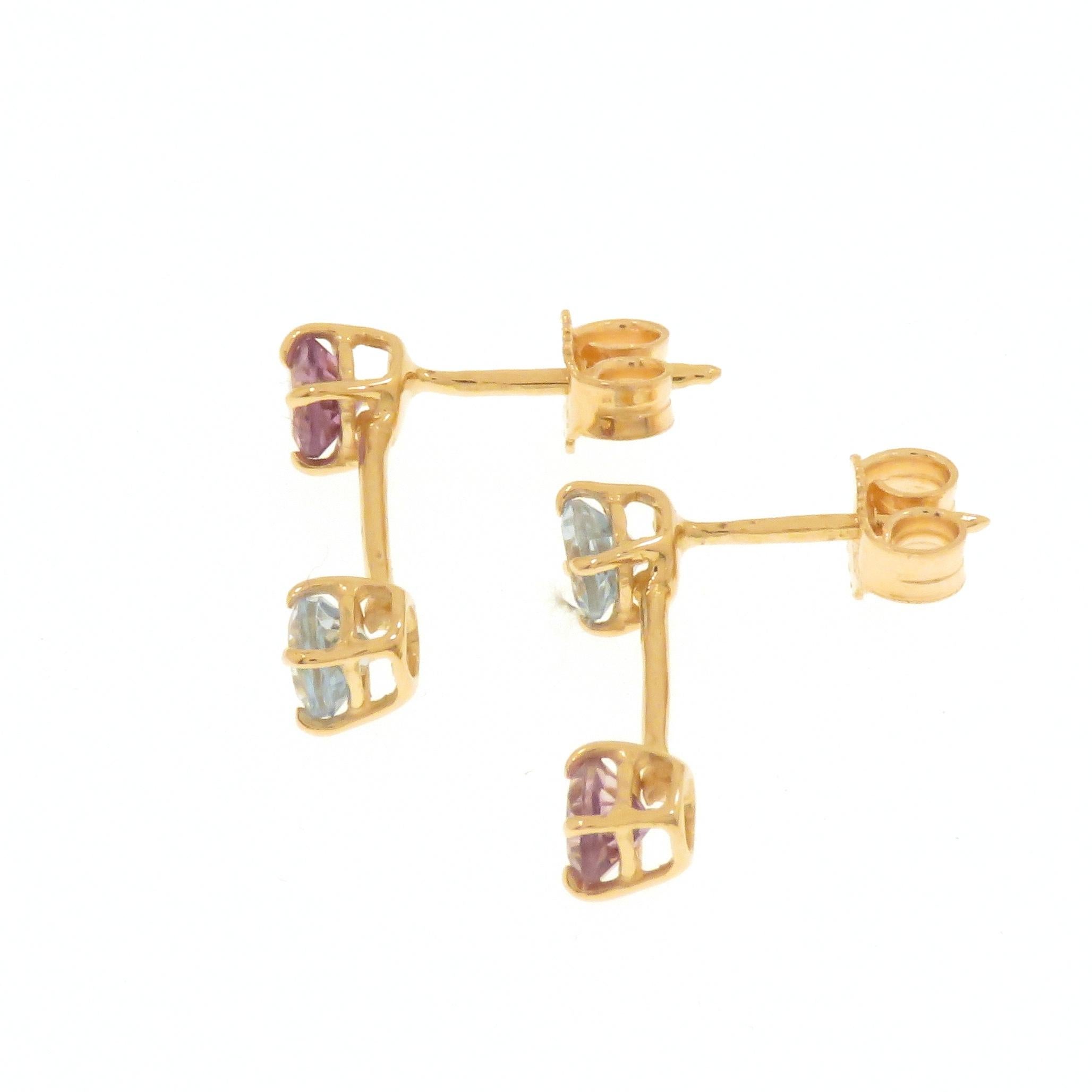 Earrings handmade in 9 carat rose gold with brilliant cut amethyst and blue topaz, diameter 0.157 inches. 

Total weight: 1.6 gram.

Marked with 9 carat gold mark and Botta Gioielli Italian mark 716MI.

Handmade in: 9 carat rose gold.
2 brilliant