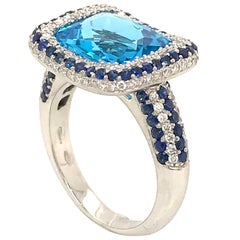 Blue Topaz and Blue Sapphire with Diamonds on White Gold 18 Karat Cocktail Ring