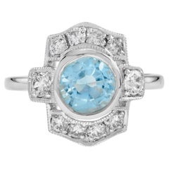 Blue Topaz and Diamond Art Deco Style Halo Ring in 14k White Gold