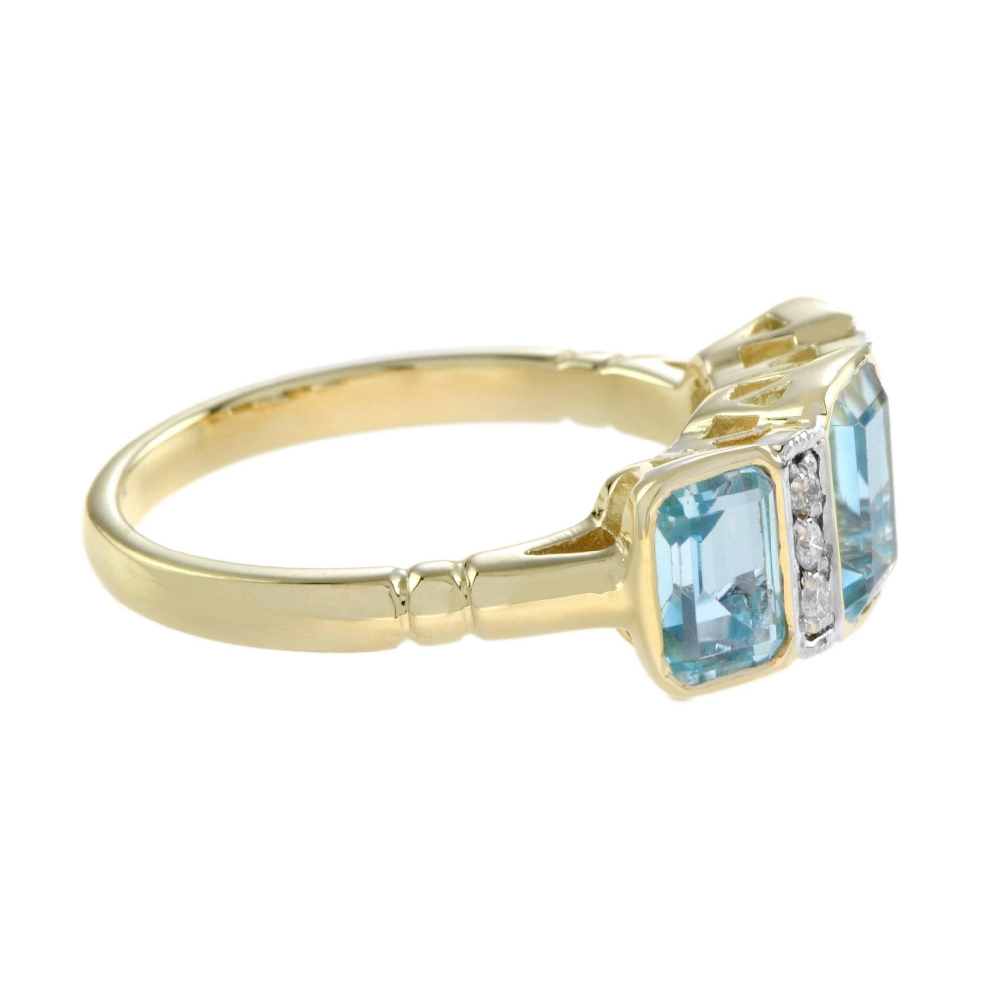 Dreisteinring aus 14 Karat Gelbgold mit blauem Topas und Diamanten im Art-déco-Stil (Smaragdschliff) im Angebot